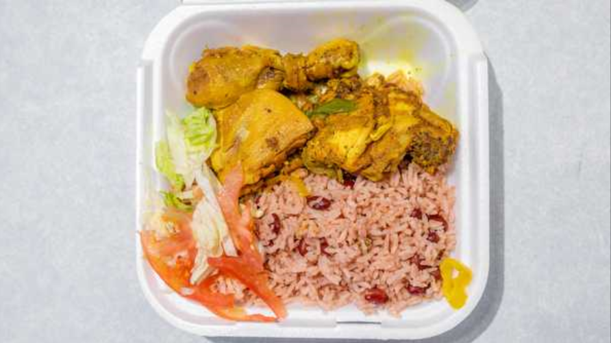 Order Curry Chicken with Rice & Beans food online from Jamaica Best Restaurant store, Dayton on bringmethat.com