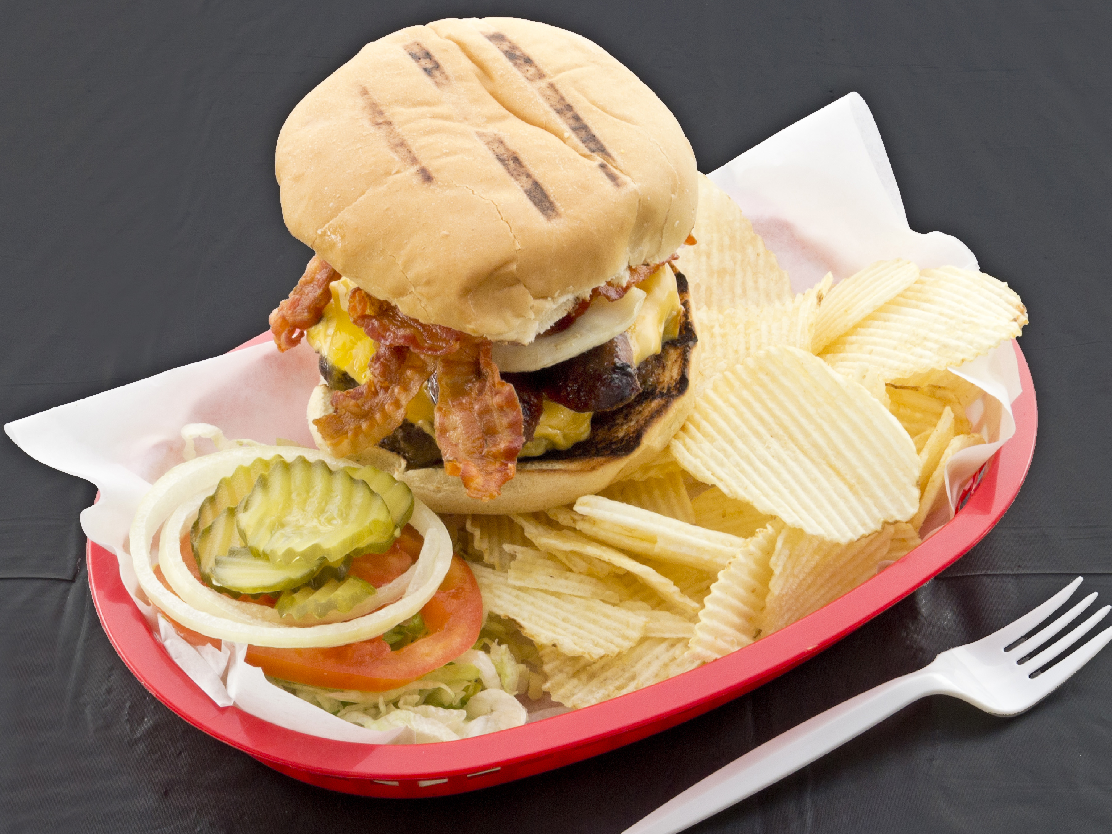 Order The Donald Burger food online from Strokers Ice House store, Dallas on bringmethat.com