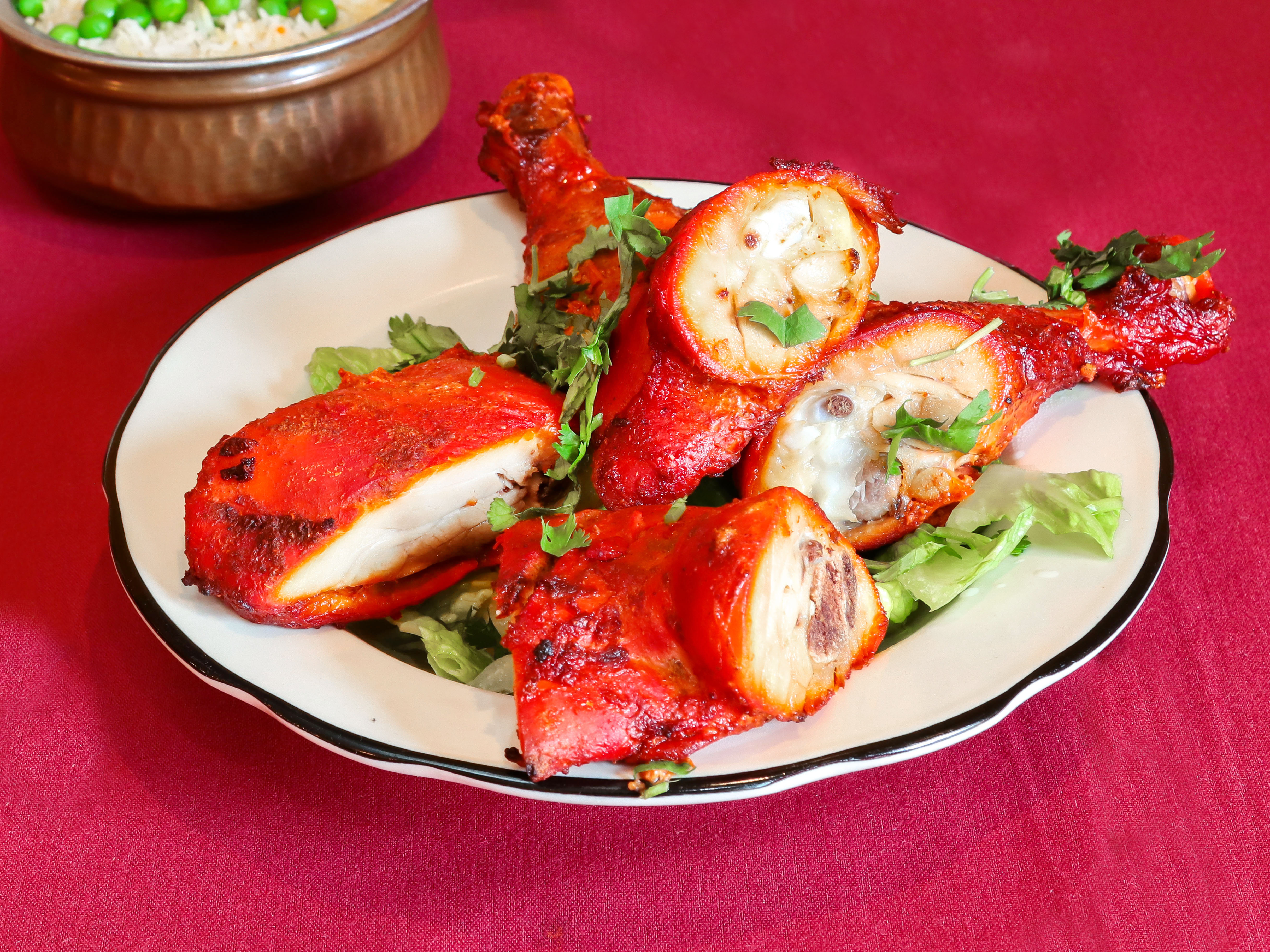 Order Tandoori Chicken food online from Saffron Indian Cuisine - Broad St. store, Philadelphia on bringmethat.com
