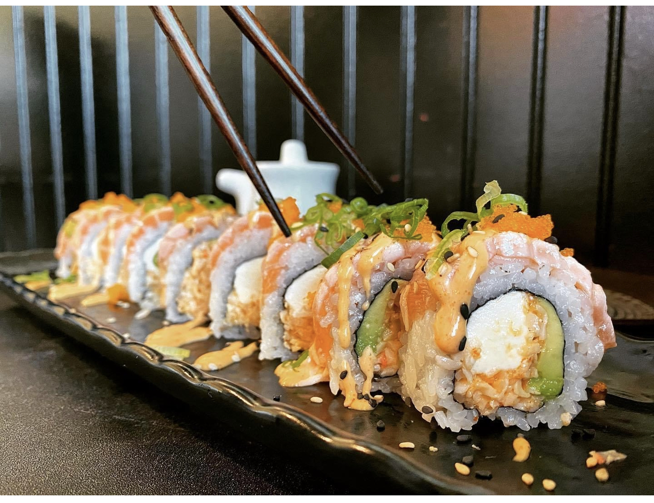 Order Salmon Lovers Roll food online from Sushi Studio store, Long Beach on bringmethat.com