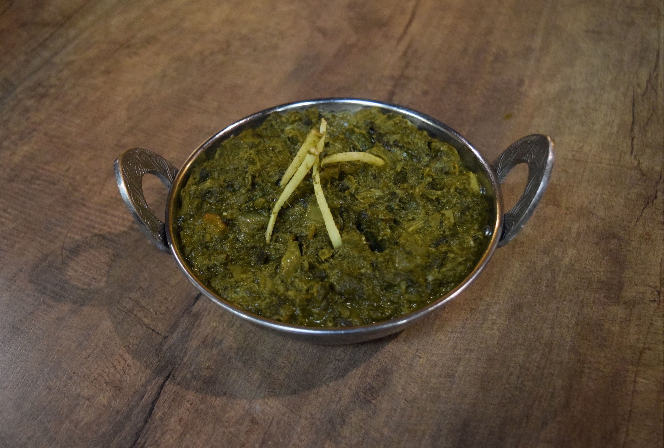 Order Chicken Saag food online from Sattva Indian Rasoi store, Mission Viejo on bringmethat.com
