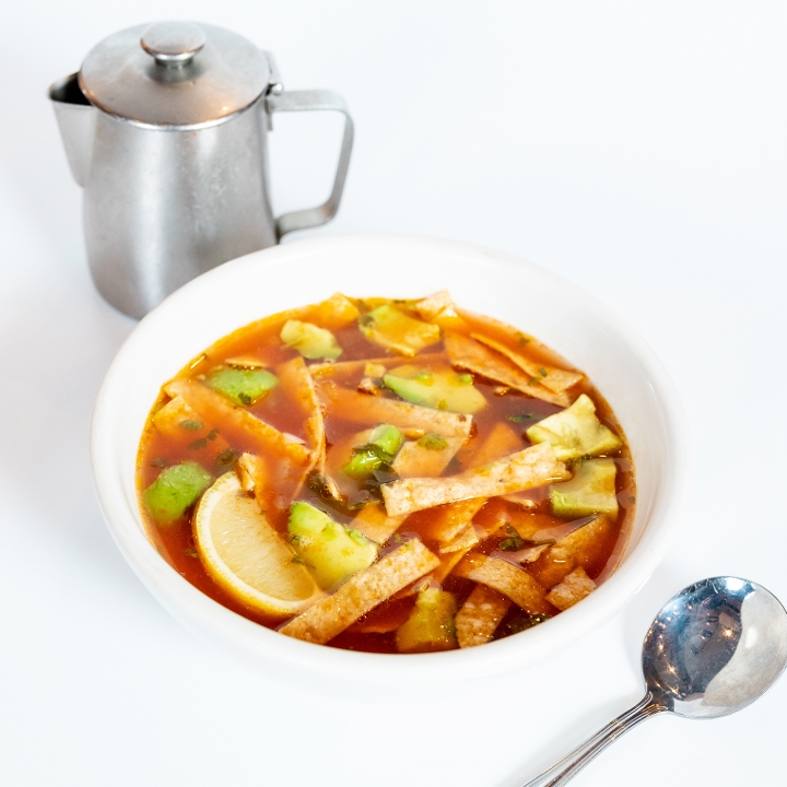 Order Our Famous Tortilla Soup - Large food online from El Fenix store, Waxahachie on bringmethat.com