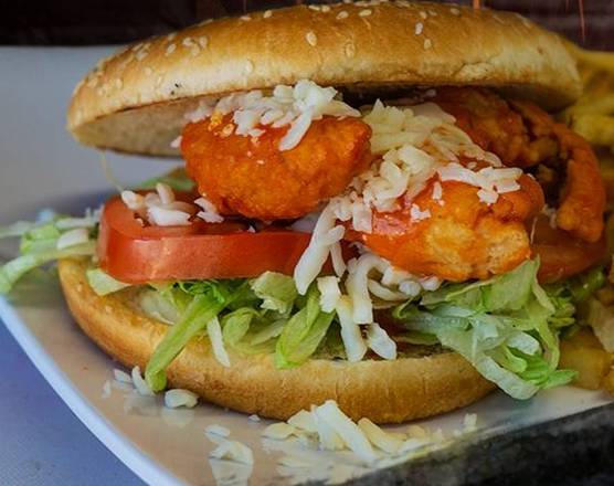Order Buffalo Chicken Sandwich food online from Wings & Burgers To Go store, Denver on bringmethat.com