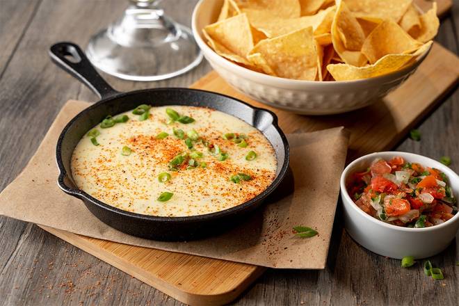 Order Queso & Chips food online from Logans Roadhouse store, Portage on bringmethat.com
