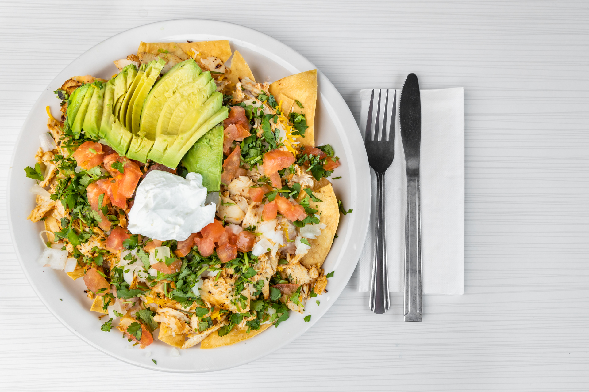 Order Nachos Supreme food online from Goody Cafe store, Palm Desert on bringmethat.com