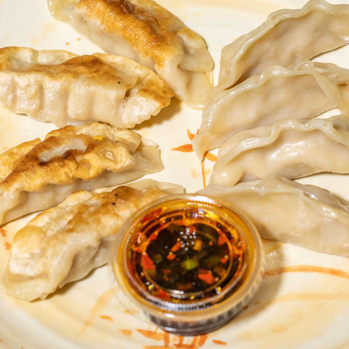 Order A4. Chicken Dumplings food online from Taste Of China store, Montgomery on bringmethat.com