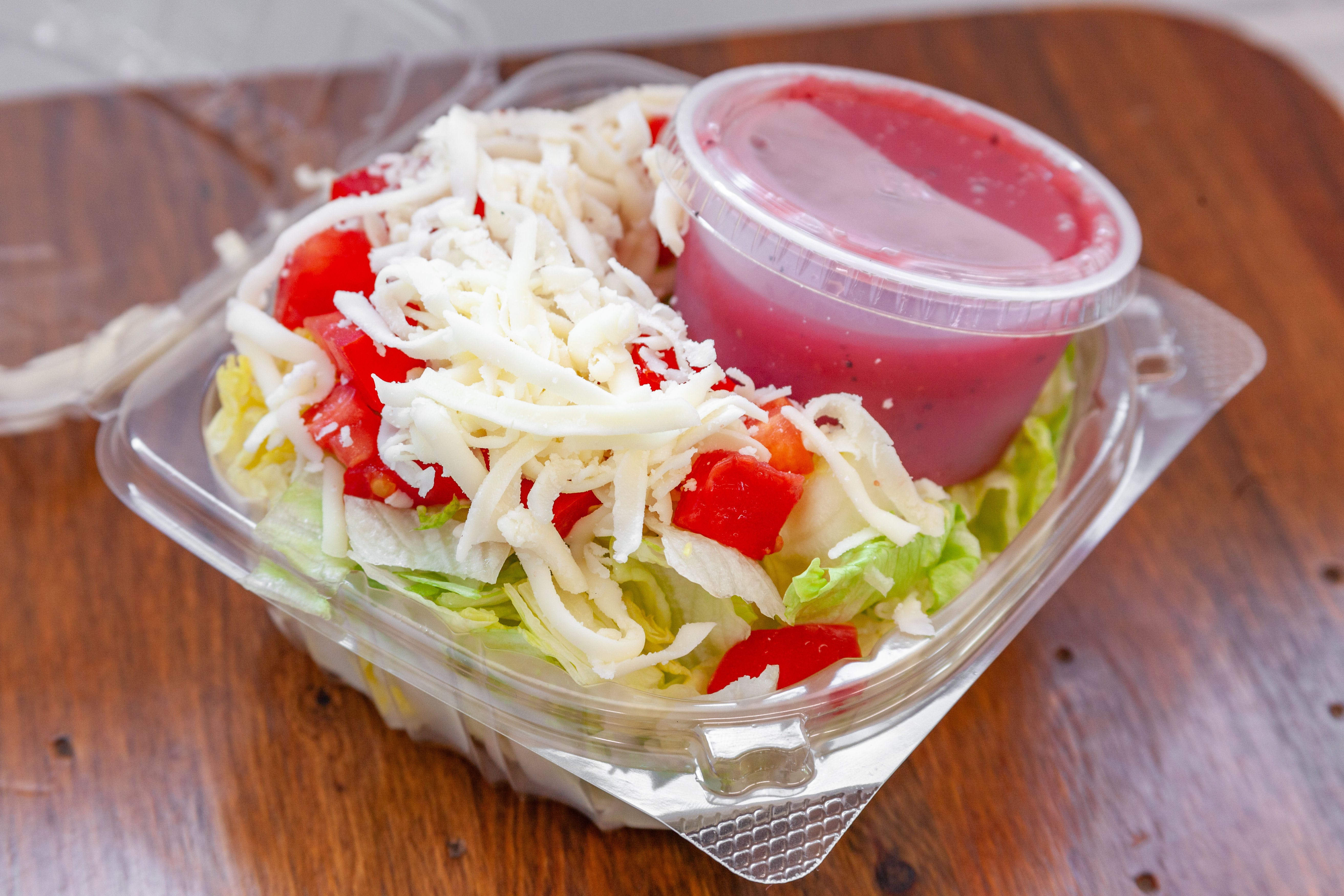 Order Tossed Salad - Small food online from Gianni Pizza & Italian Ristorante store, Hillsboro on bringmethat.com