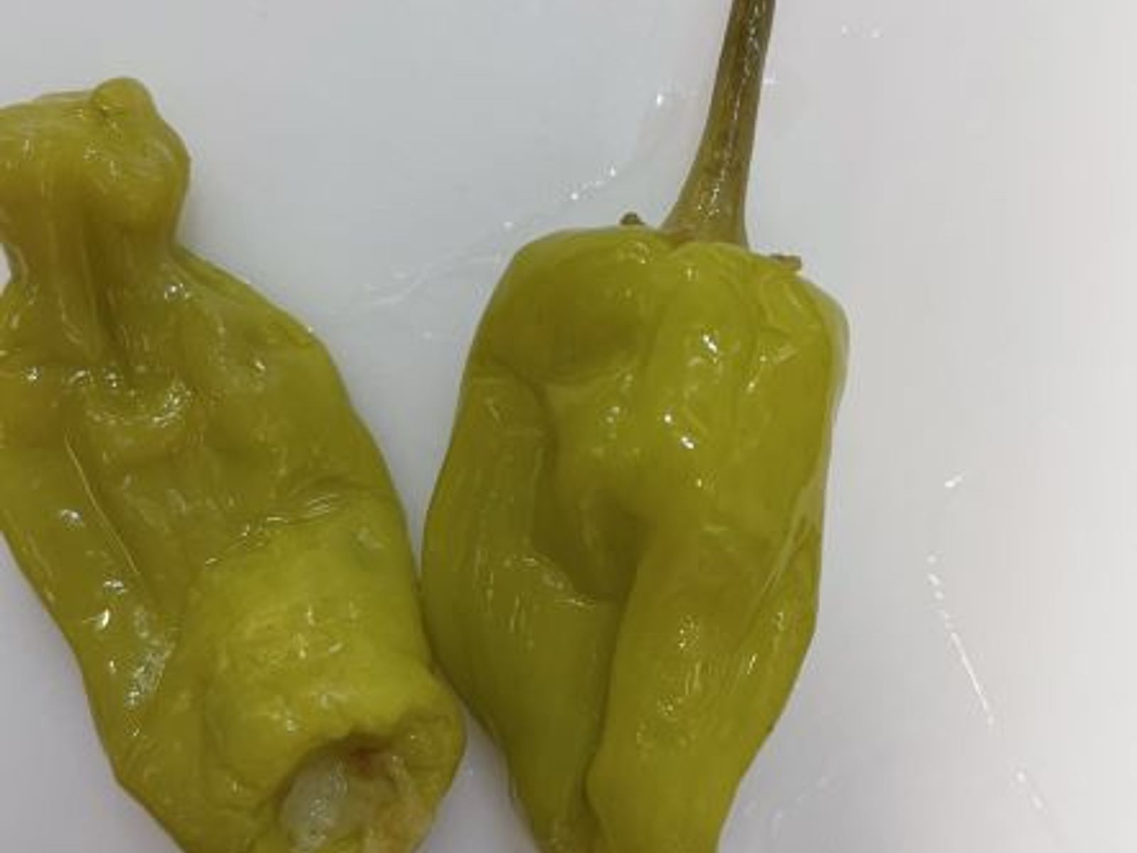 Order Side Of Banana Peppers food online from Pepperoni's Pizza store, Richmond on bringmethat.com