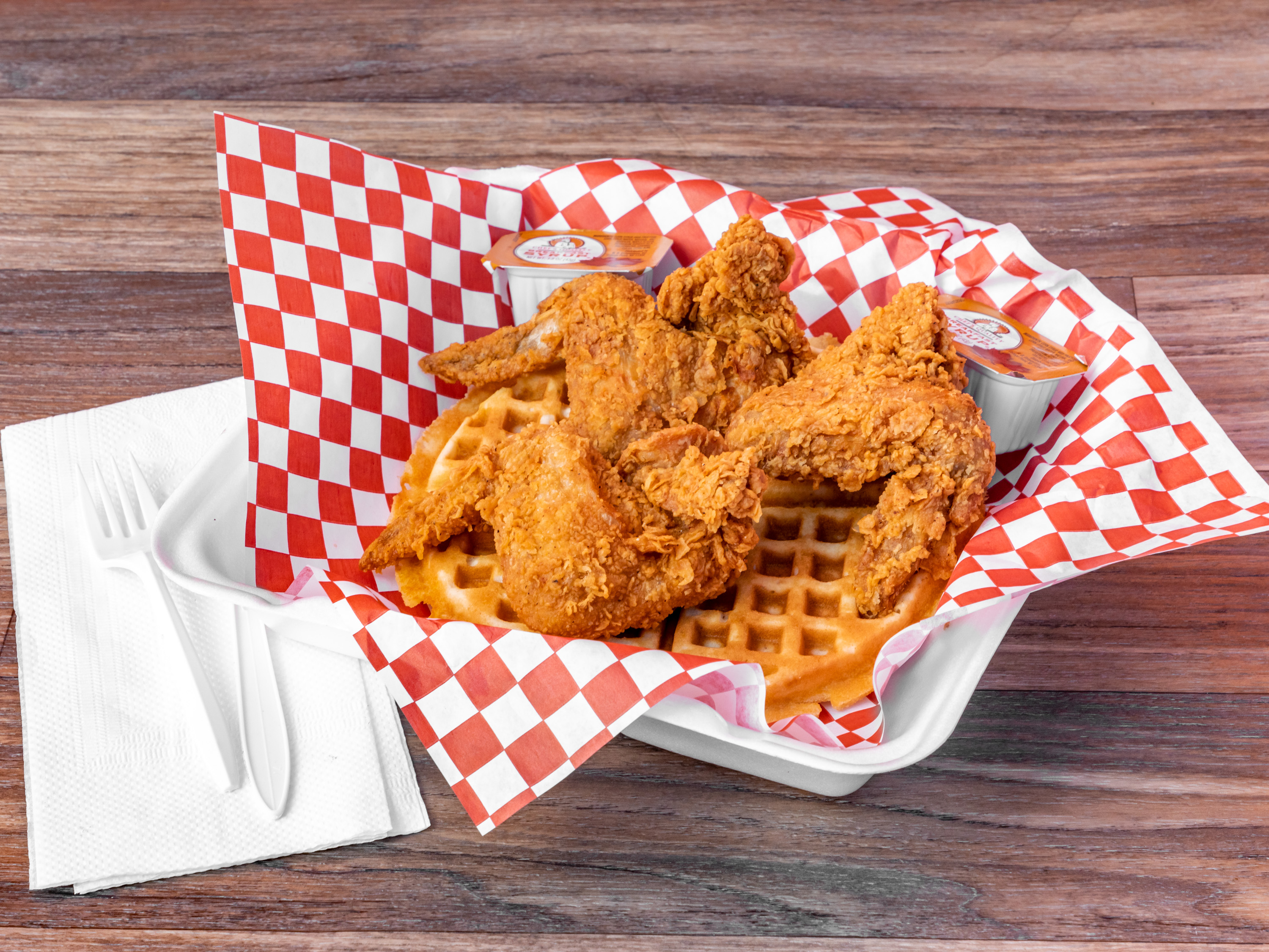 Order 3 Piece Chicken and Waffle food online from Charlie Famous Fried Chicken store, Los Angeles on bringmethat.com