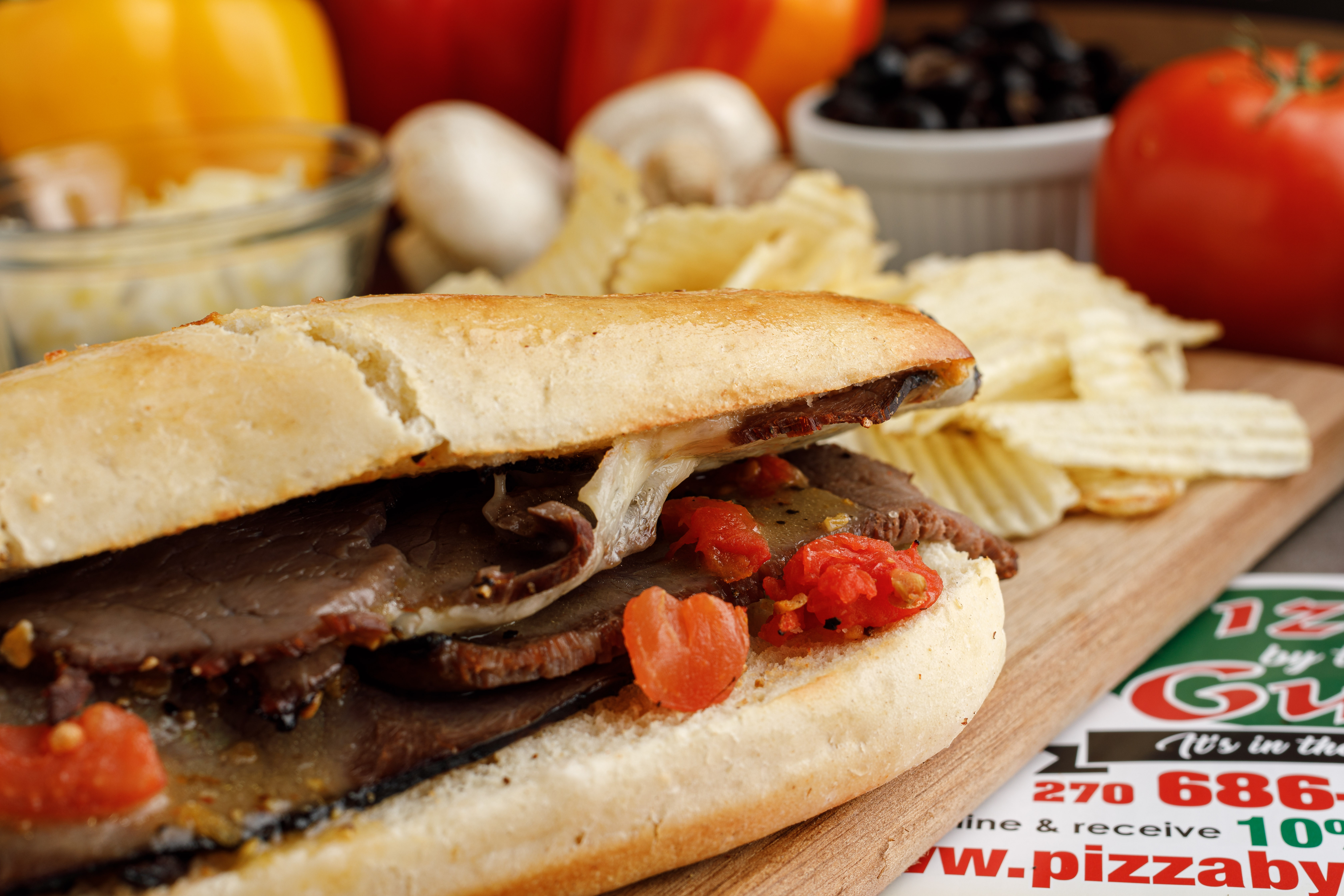 Order Roast Beef Sub Sandwich food online from Pizza by the Guy store, Owensboro on bringmethat.com