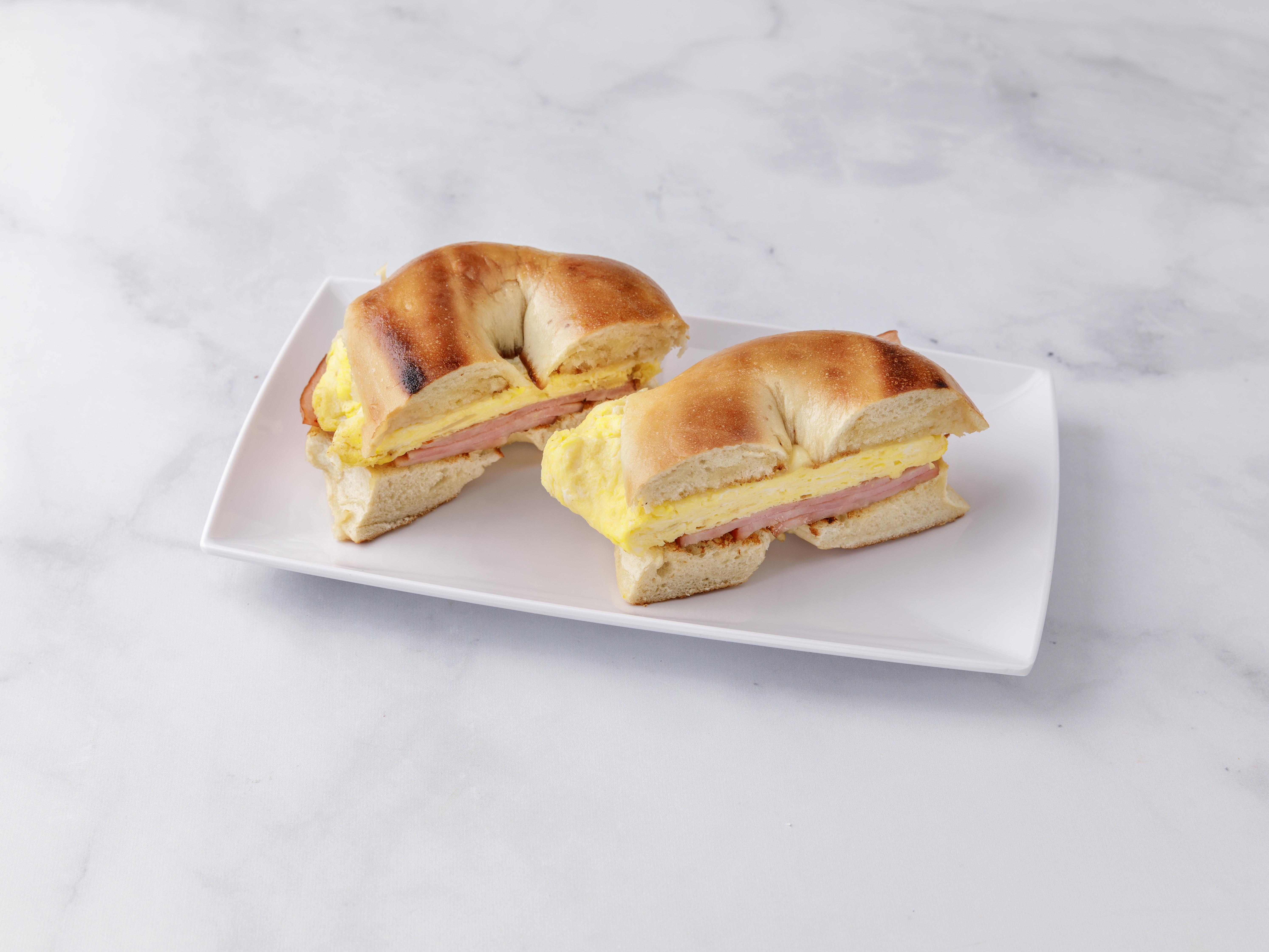 Order Eggs, Meat and Cheese Sandwich food online from John Coffee Shop store, New York on bringmethat.com