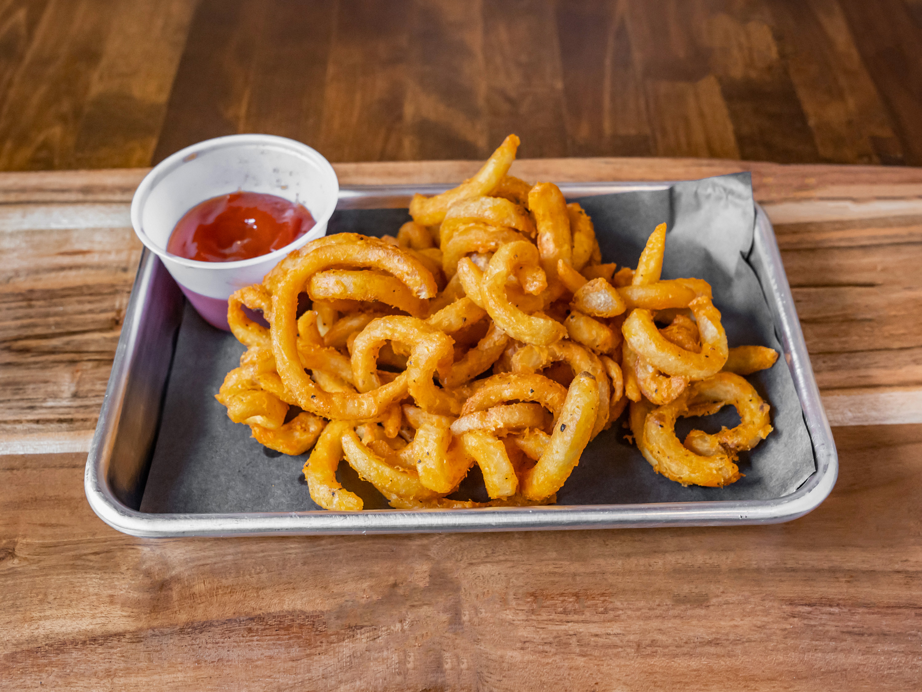Order Curly Fries food online from Empire Bagels store, Brewster on bringmethat.com
