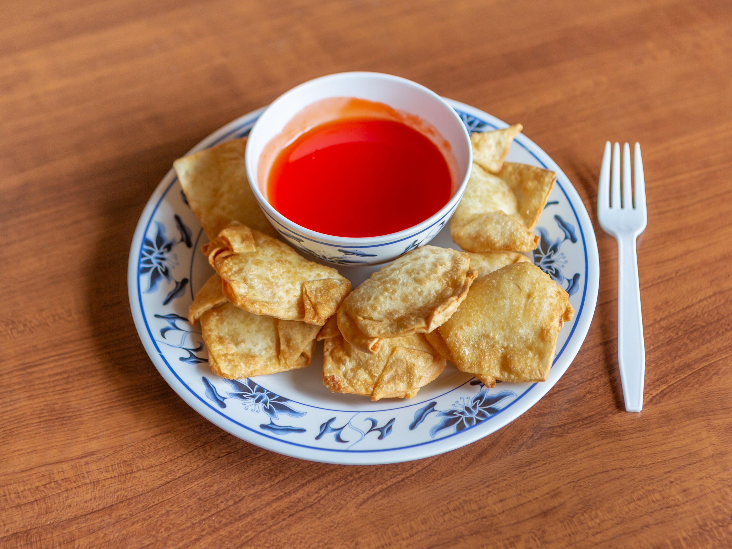 Order 8. Crab Cheese Wonton food online from Guilin store, Saline on bringmethat.com