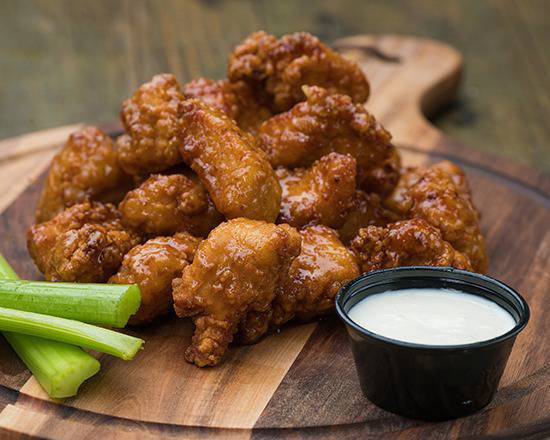 Order 10 Boneless Wings food online from Hurricane Wings store, North Richland Hills on bringmethat.com