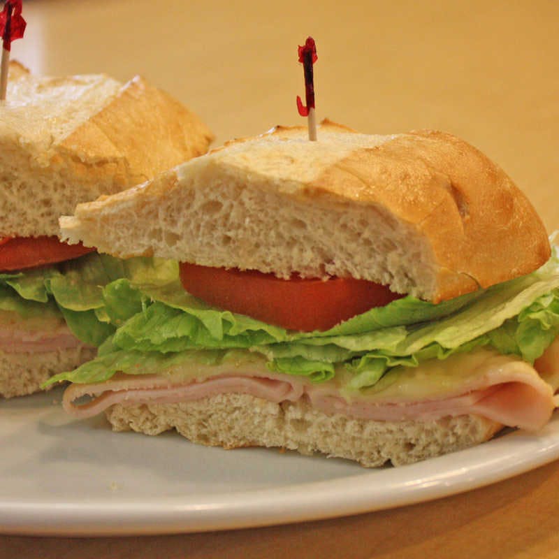 Order Turkey Club Sandwich - Sandwich food online from Straw Hat Pizza store, Rancho Cordova on bringmethat.com