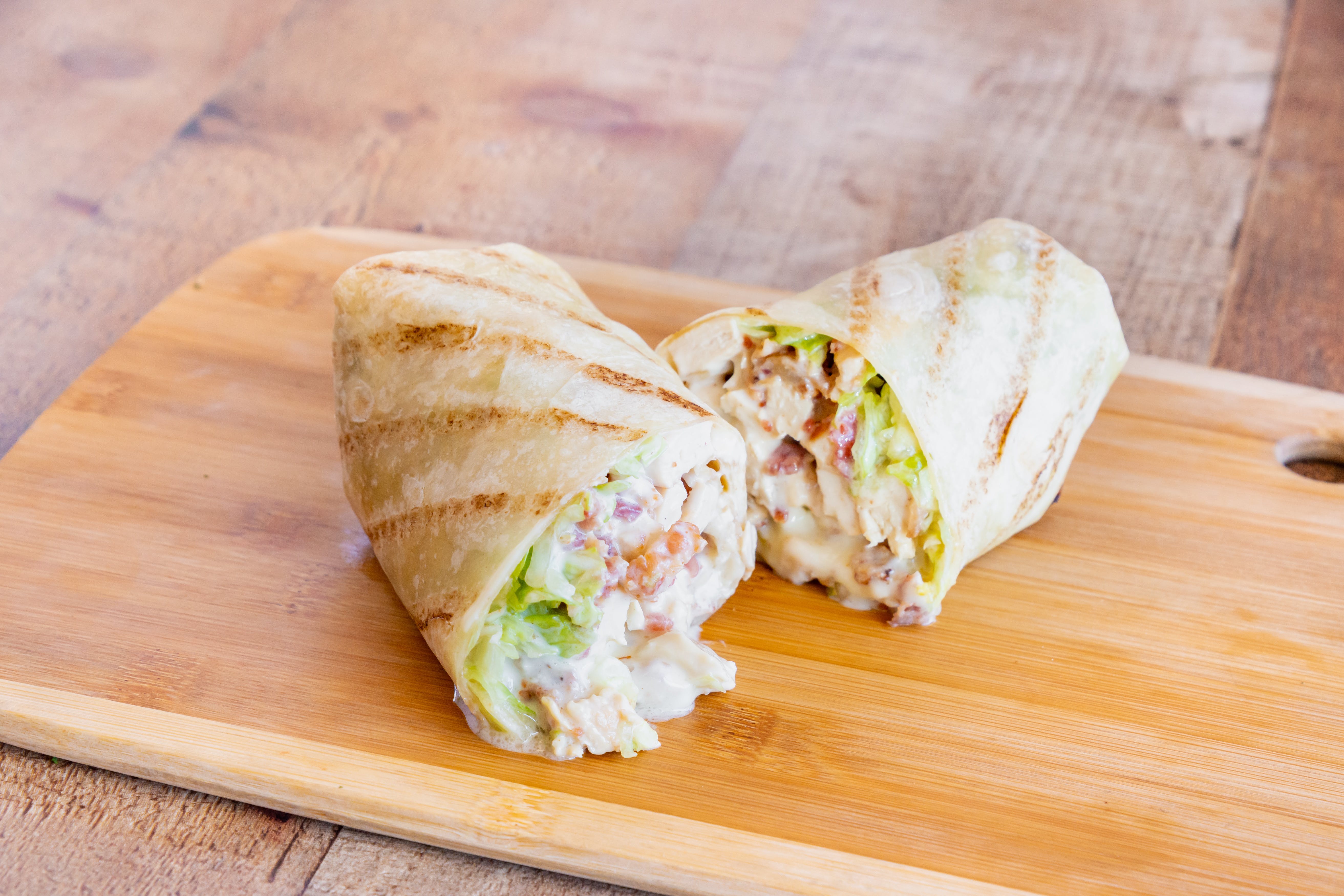 Order Grilled Chicken & Cheese Wrap - Wrap food online from Bravo Pizza store, Pottstown on bringmethat.com