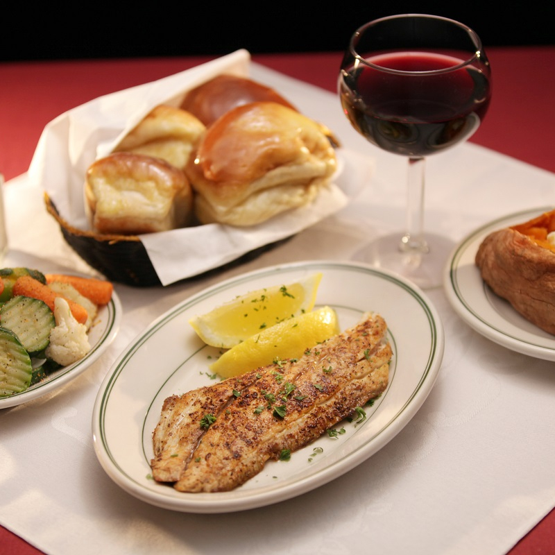 Order Grilled Fish food online from Poorboy's Riverside Inn store, Broussard on bringmethat.com