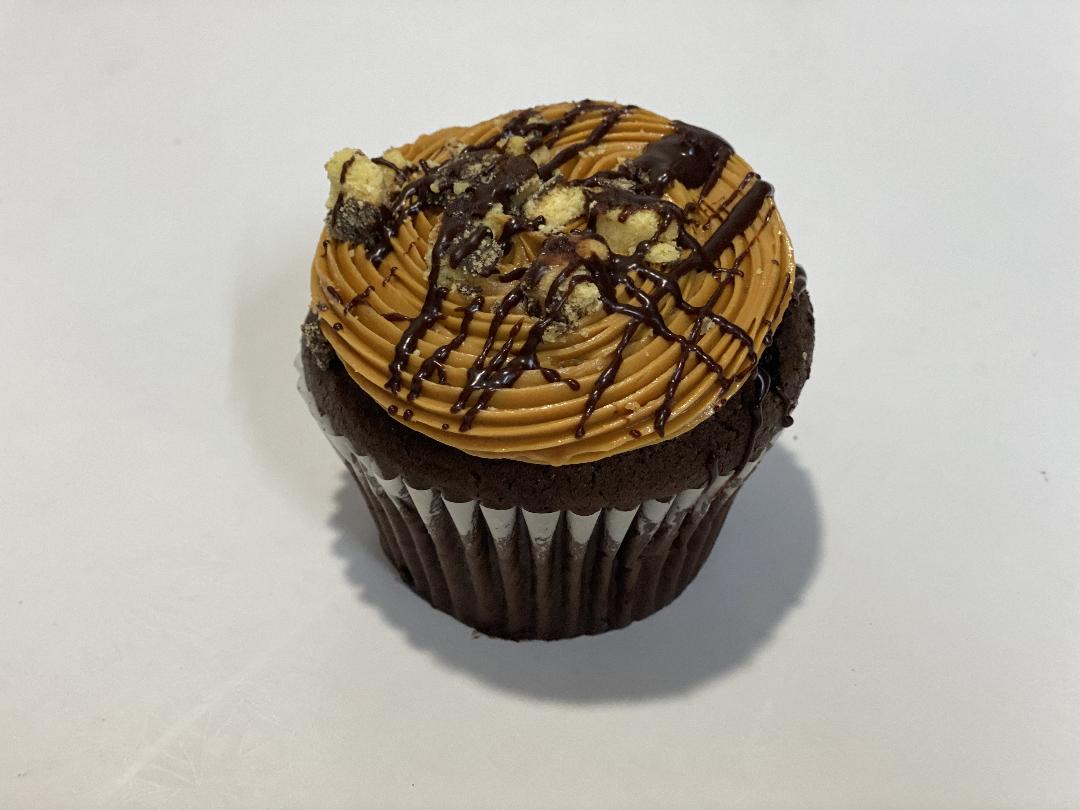 Order Twix Caramel Colossal Cupcake food online from E & L Bakery store, Bronx on bringmethat.com