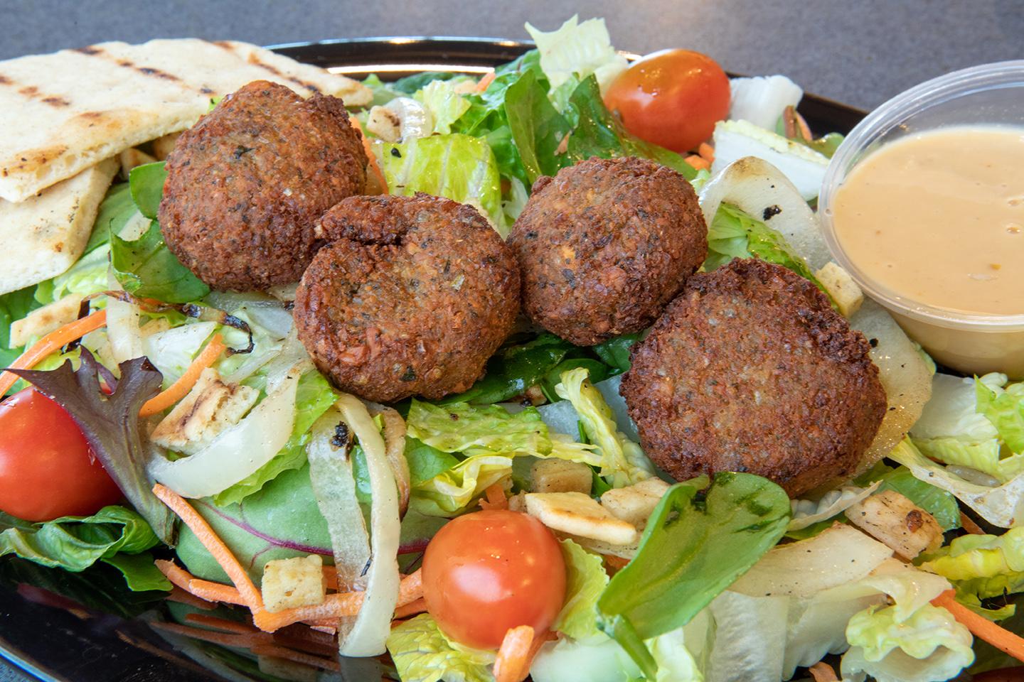Order Salad - Falafel food online from Sticks Kebob Shop store, Charlottesville on bringmethat.com