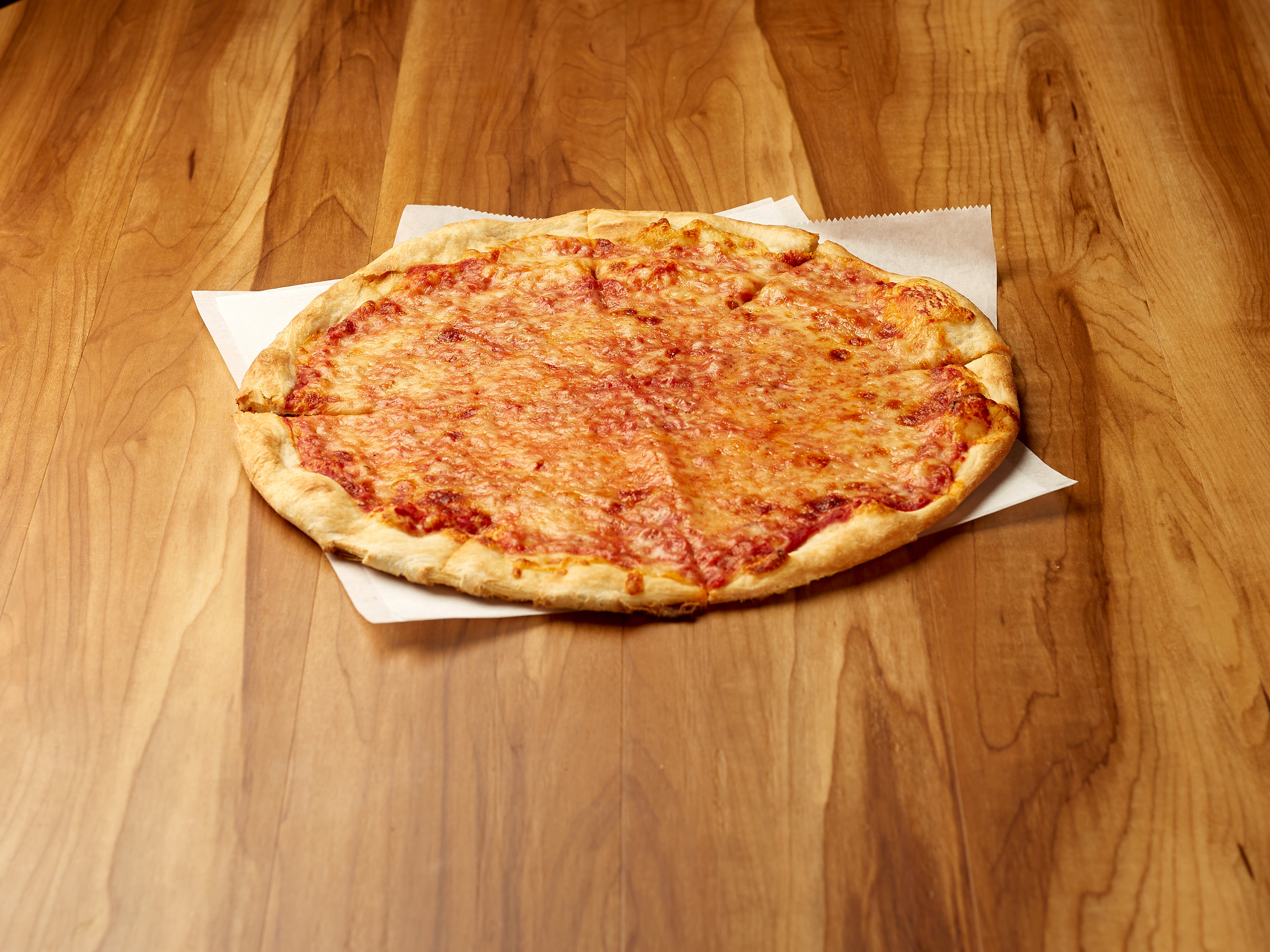 Order 14" Pizza food online from Uncle's Pizza store, Norwalk on bringmethat.com