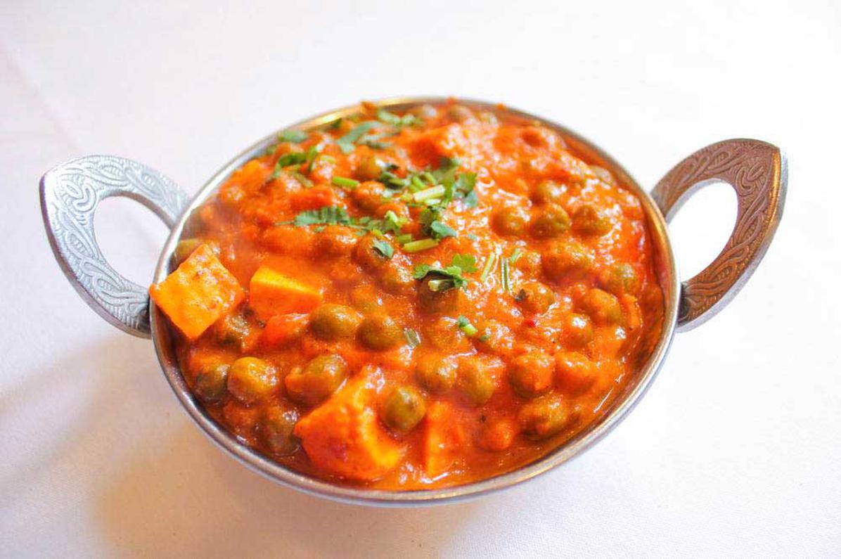 Order Matar Paneer food online from India Quality Restaurant store, Boston on bringmethat.com