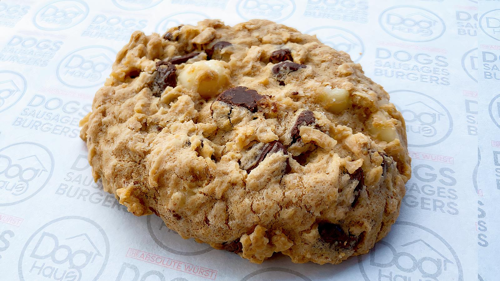 Order Royale Cookie (macadamia nuts, fresh coconut and semisweet chocolate) food online from Jailbird store, Los Angeles on bringmethat.com