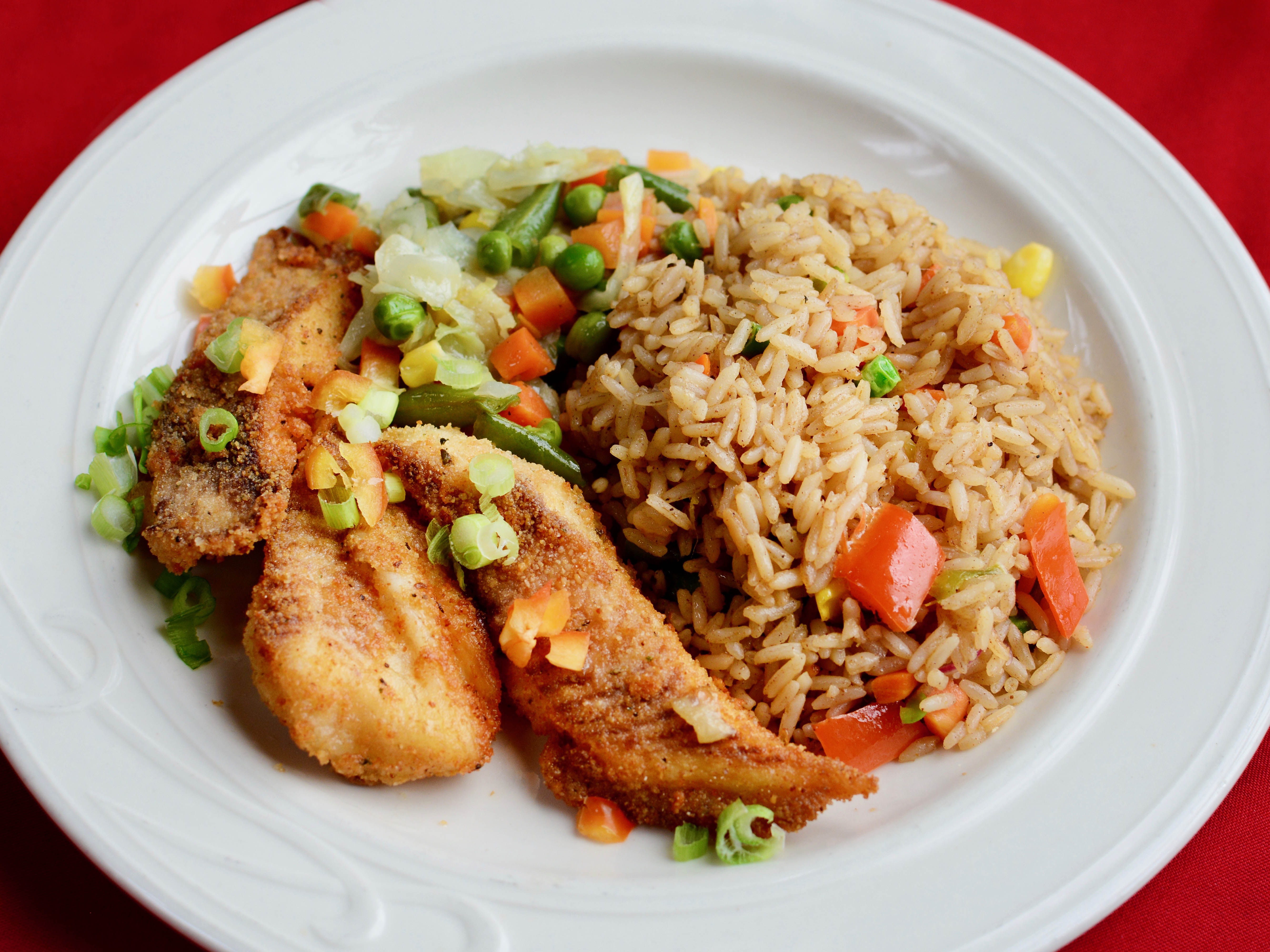 Order 2 piece Island Fish( Tilapia) dinner food online from Taste of the Caribbean store, Capitol Heights on bringmethat.com