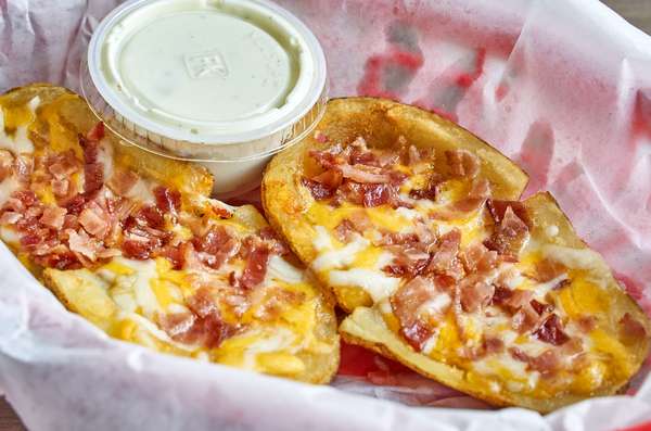 Order Potato Skins food online from Long Wong's of Laveen store, Phoenix on bringmethat.com