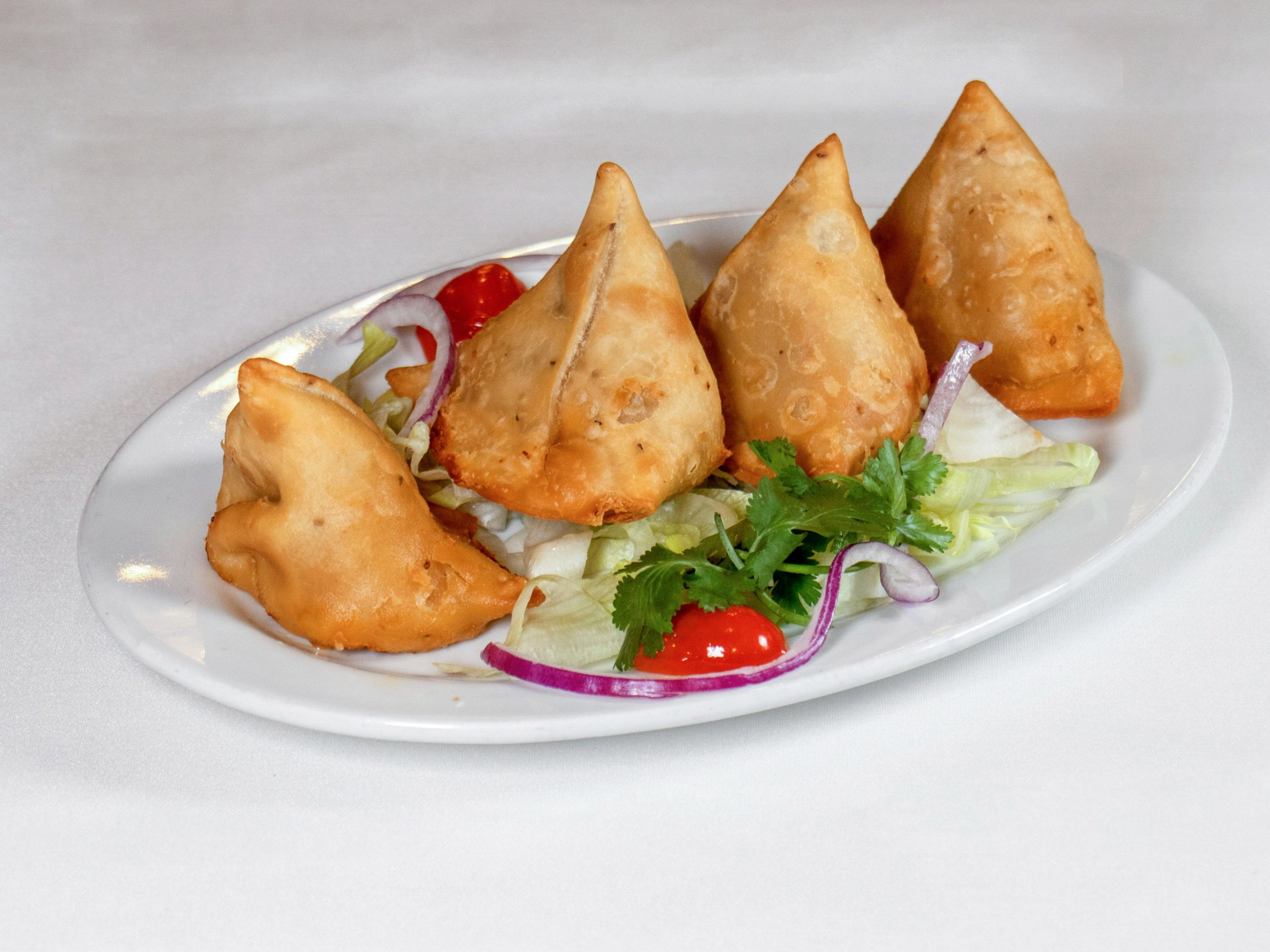 Order 6. Samosa food online from Rajaji Fine Indian Cuisine store, Washington on bringmethat.com