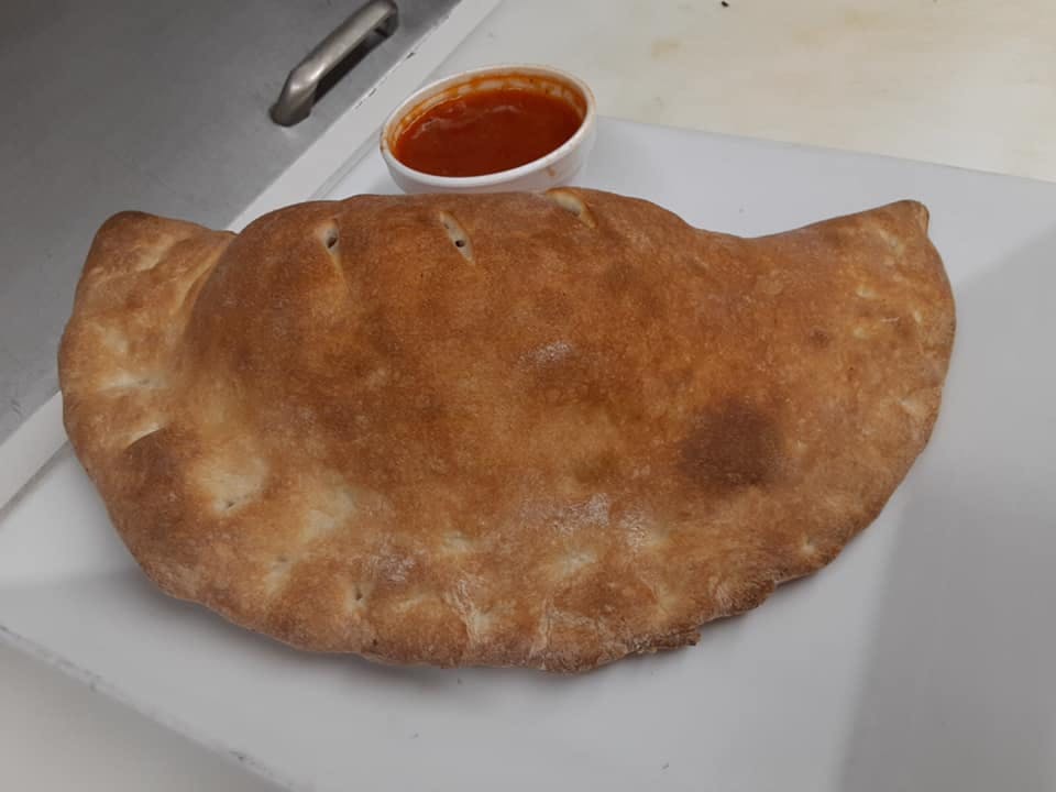 Order Calzone - Calzone food online from Noli's Restaurant store, Winsted on bringmethat.com