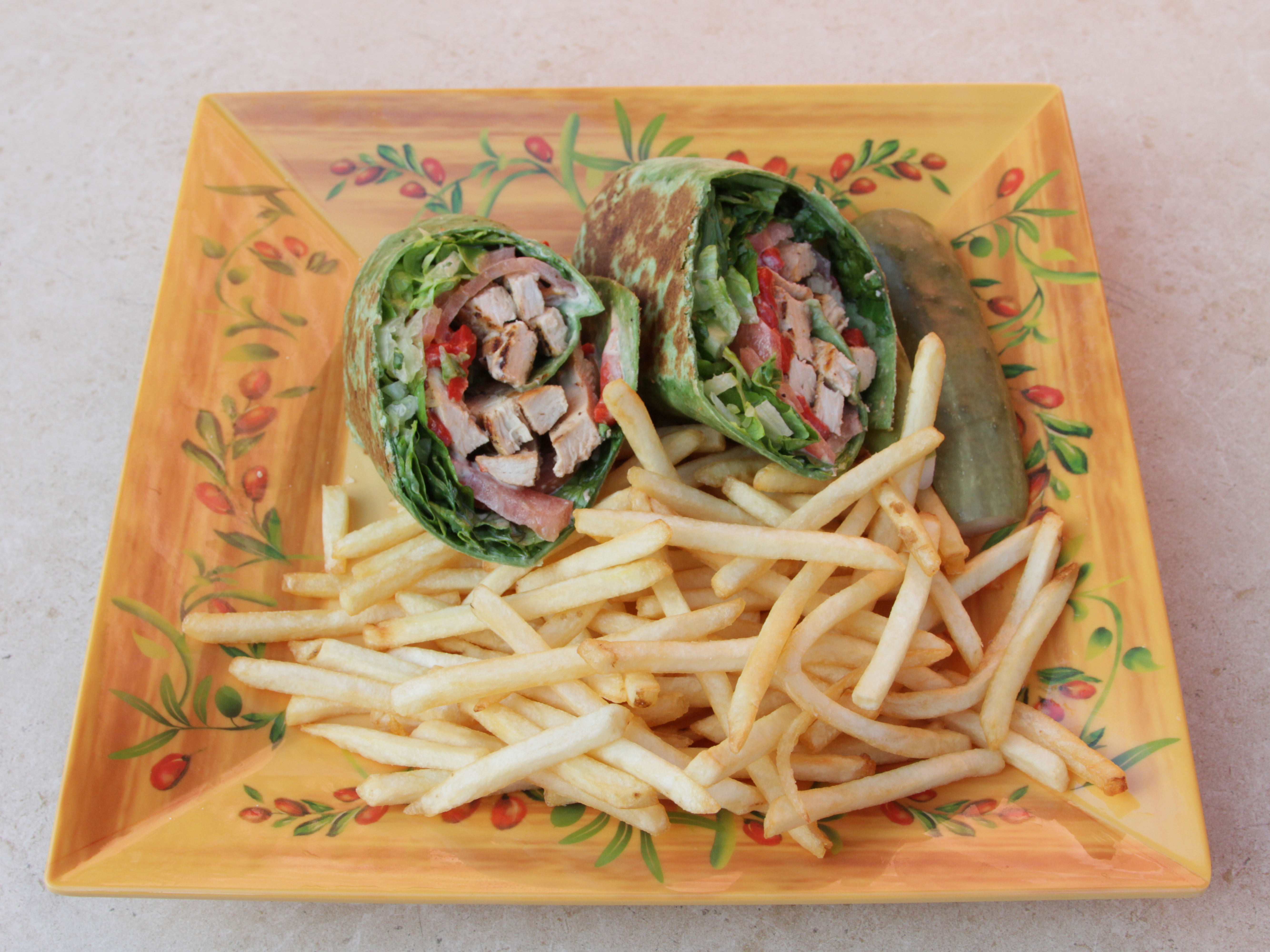 Order Grilled Chicken Caesar Wrap food online from Othello Deli store, Astoria on bringmethat.com