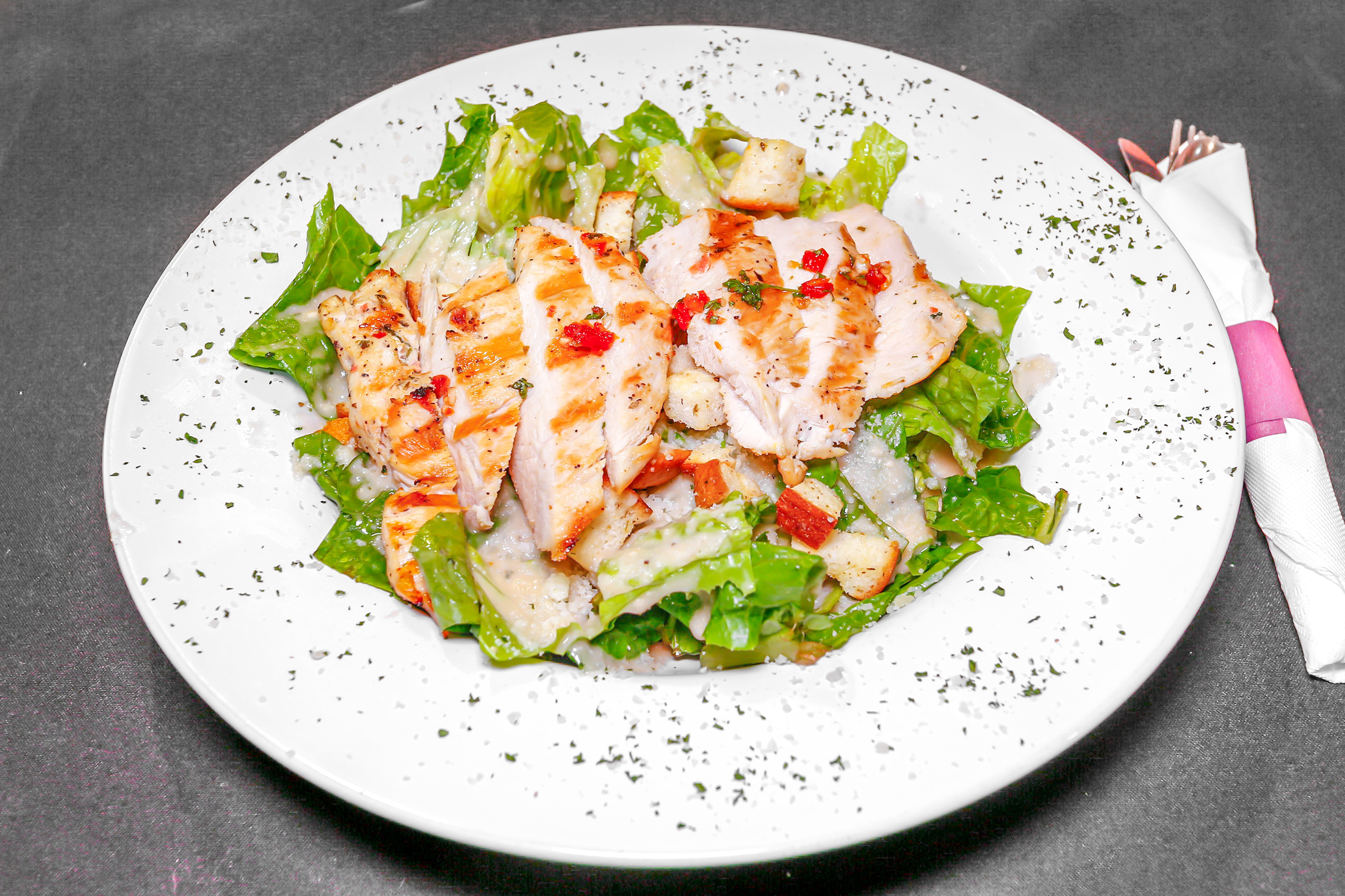 Order Caesar Salad with Grilled Chicken - Salad food online from Limeport Deli & Cafe store, Coopersburg on bringmethat.com
