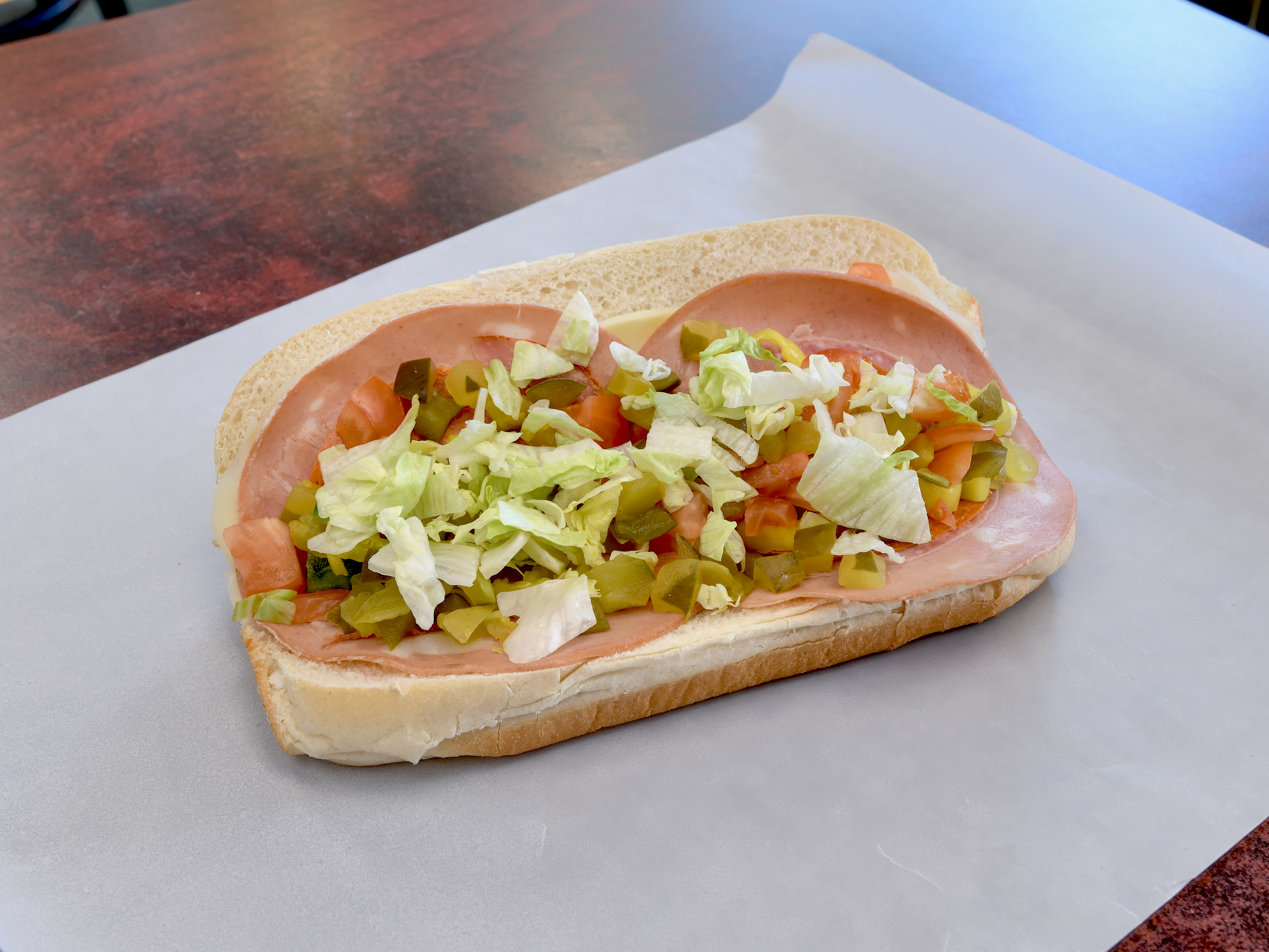 Order Italian Sub food online from Homestead Grocery & Deli store, Amherst on bringmethat.com