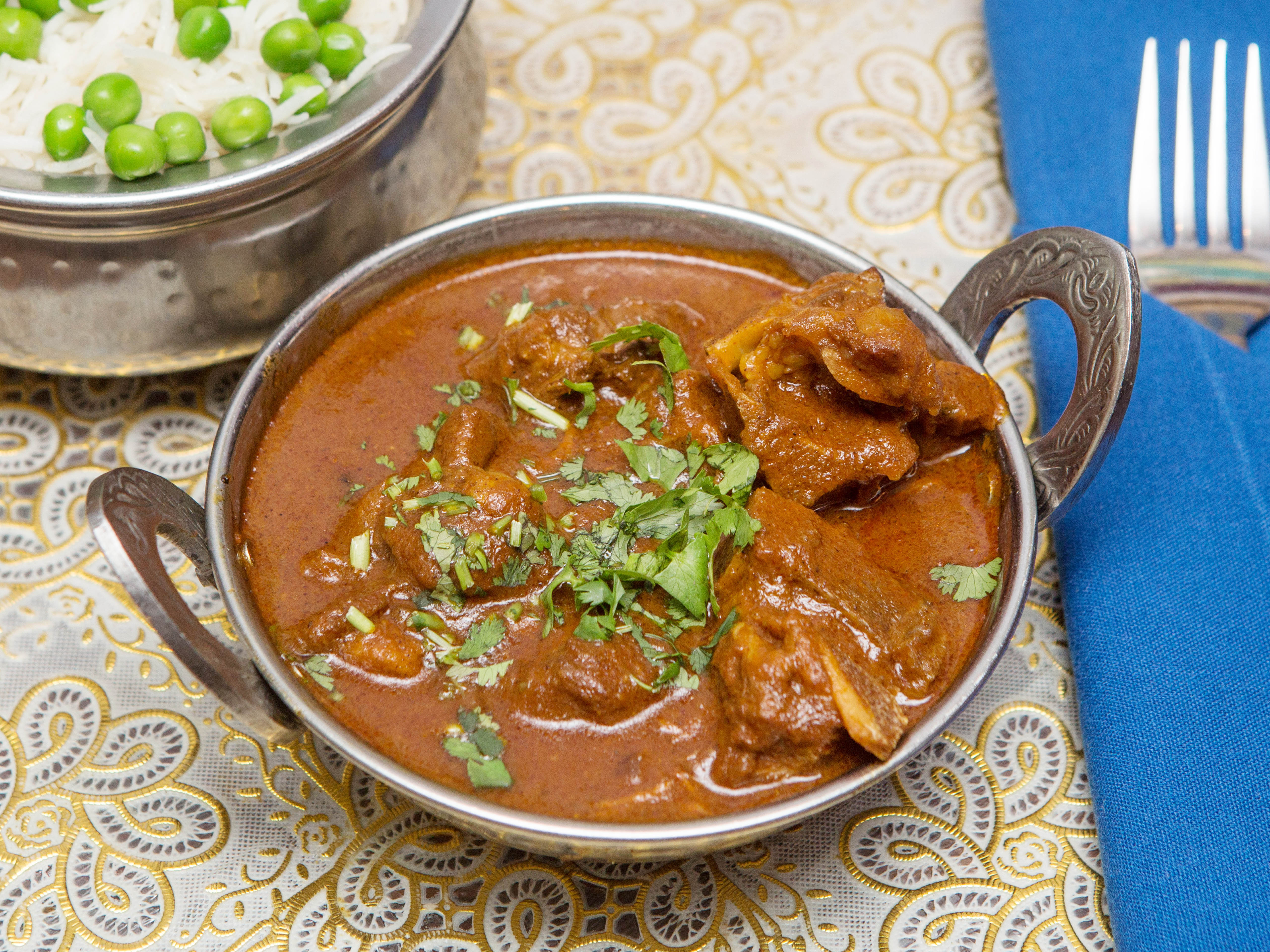 Order Mughlai Goat Curry food online from Mughlai Indian Cuisine store, New York on bringmethat.com