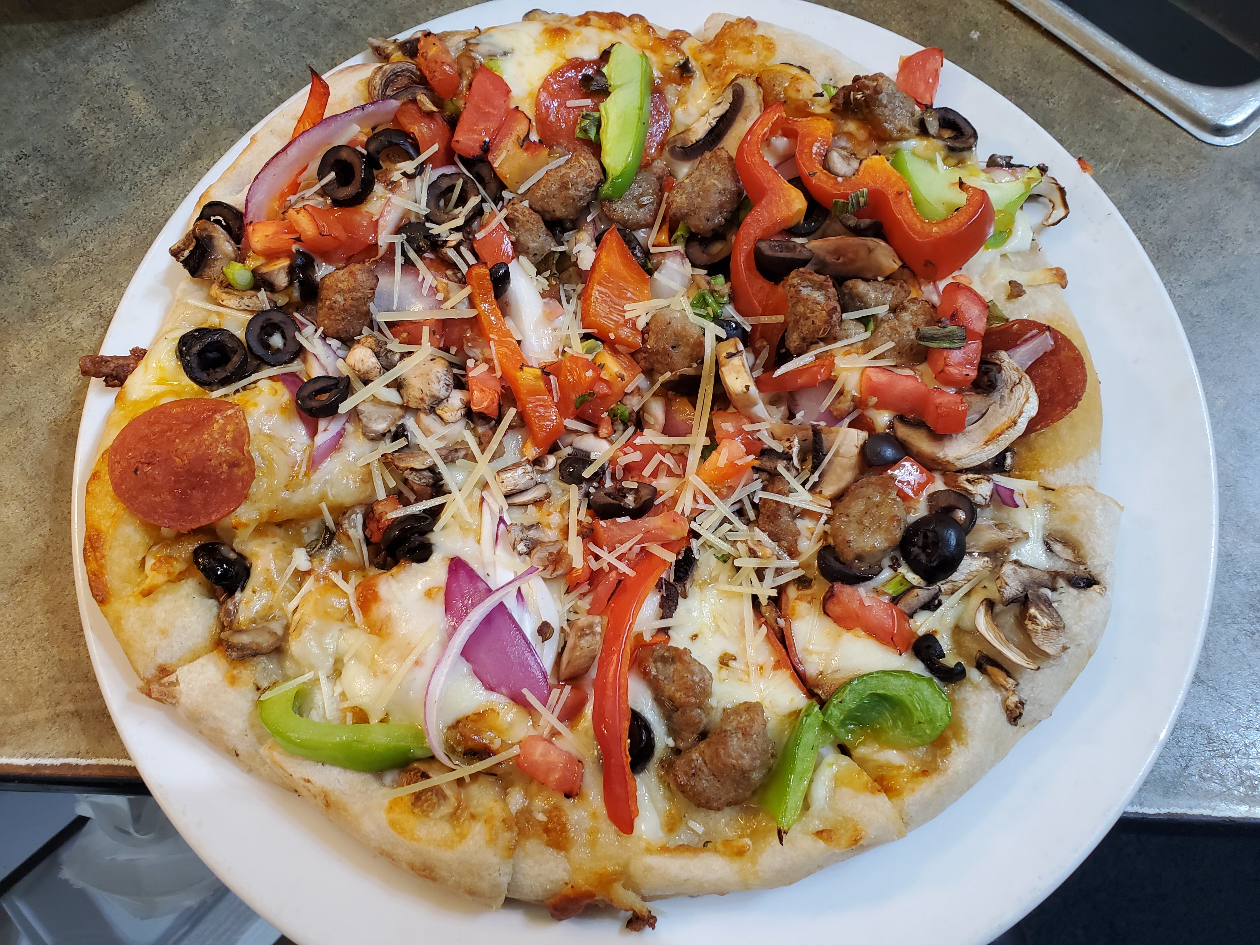 Order Italian Combo Pizza - Pizza food online from Strings Italian Cafe store, Auburn on bringmethat.com