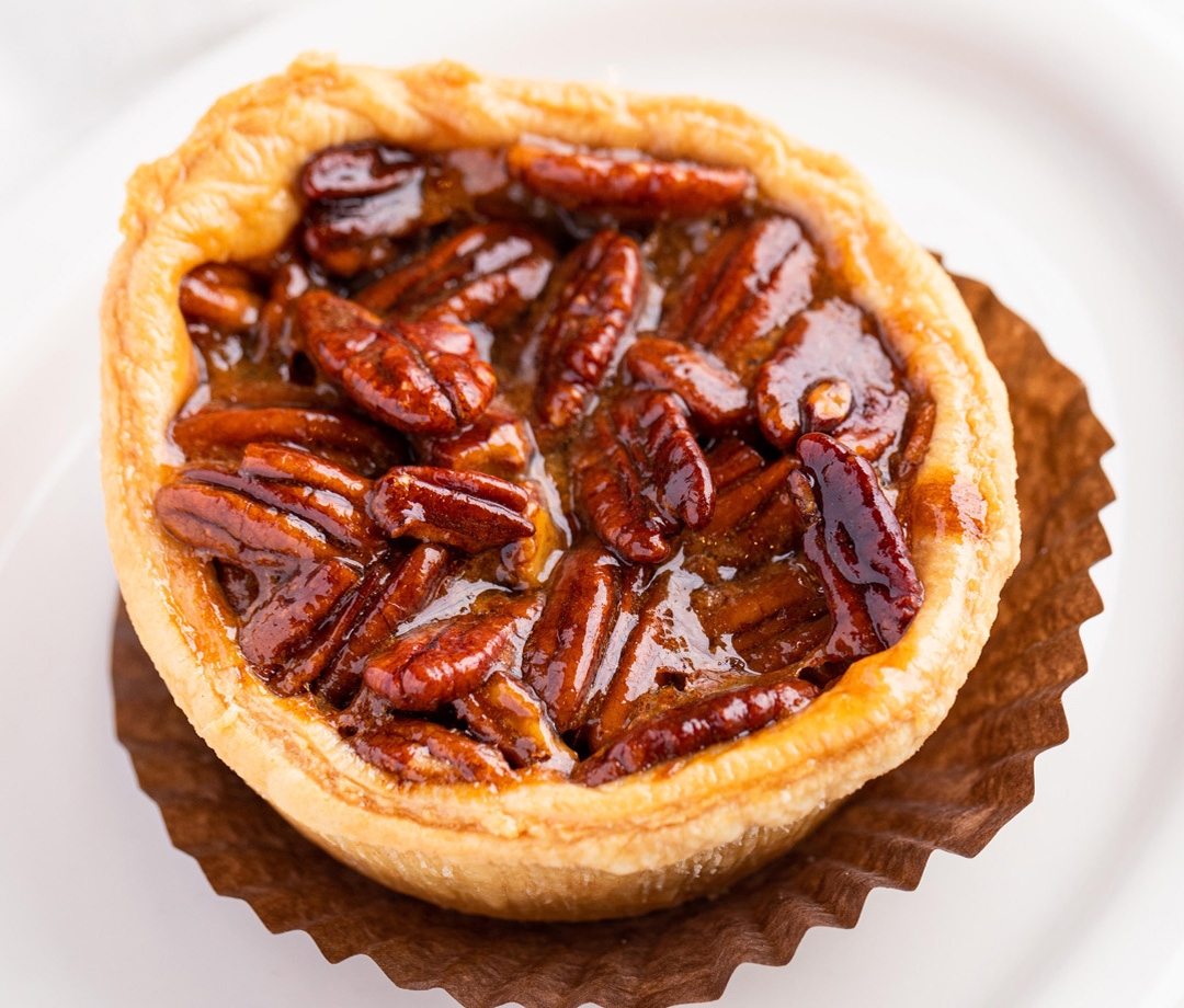 Order Old-Fashioned Pecan Pie (individual) food online from Urth Caffe store, Hawthorne on bringmethat.com