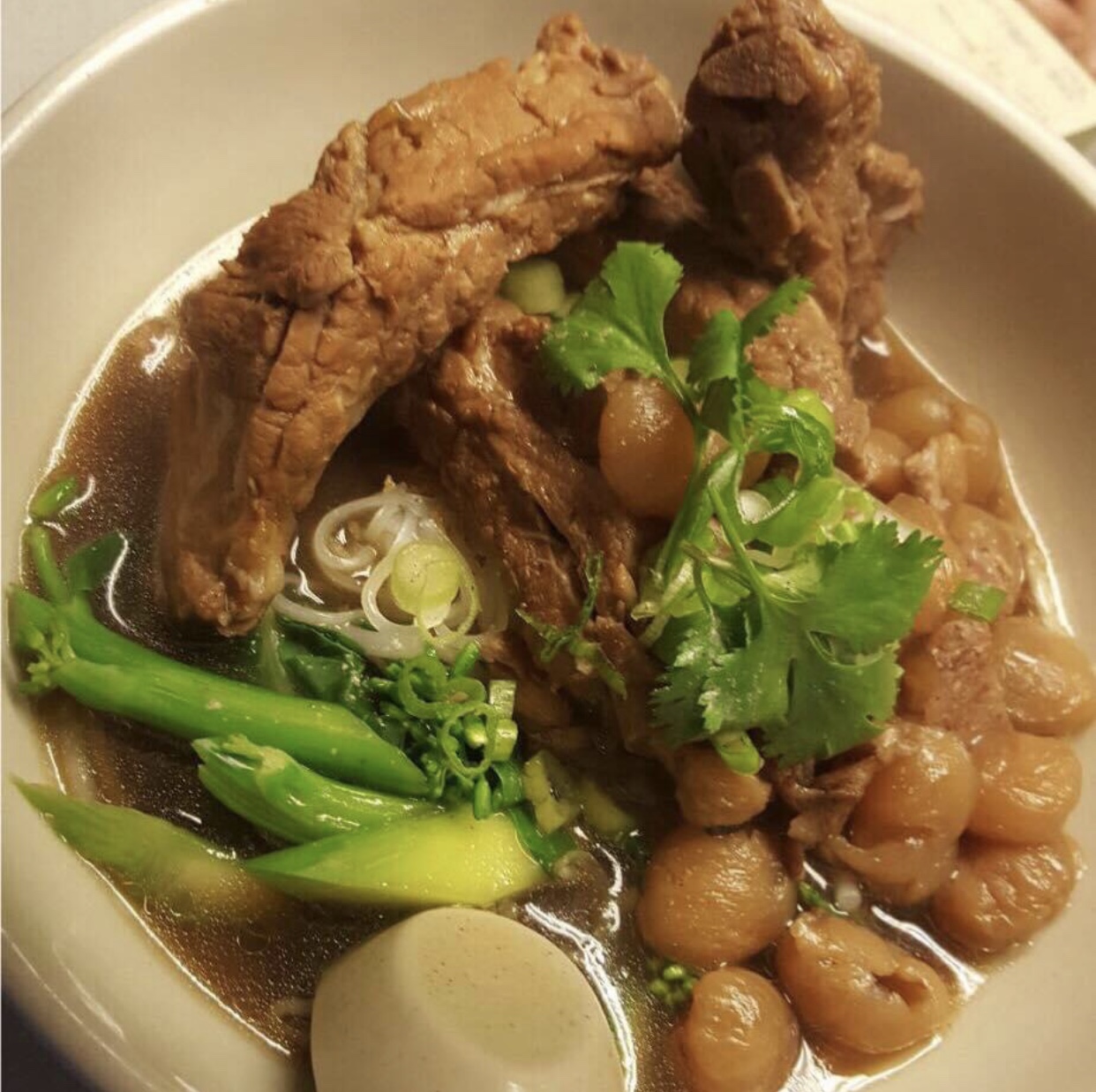 Order Braised Pork Ribs with Longan Noodle Soup food online from Orchid Thai Restaurant & Bar store, Falmouth on bringmethat.com