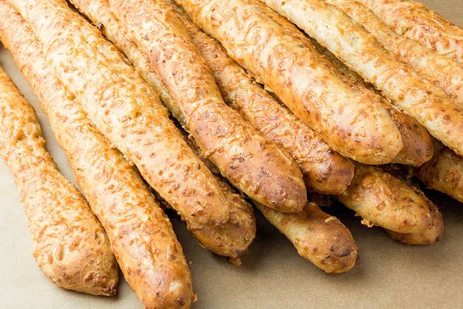 Order Garlic & Parm Breadstick food online from Breads Bakery store, New York on bringmethat.com