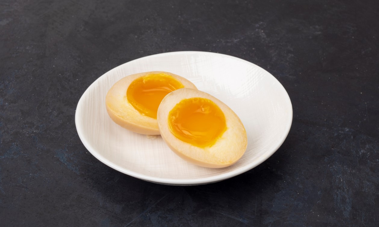 Order Add Seasoned Boiled Egg (1 egg) food online from Silverlake Ramen store, Oxnard on bringmethat.com