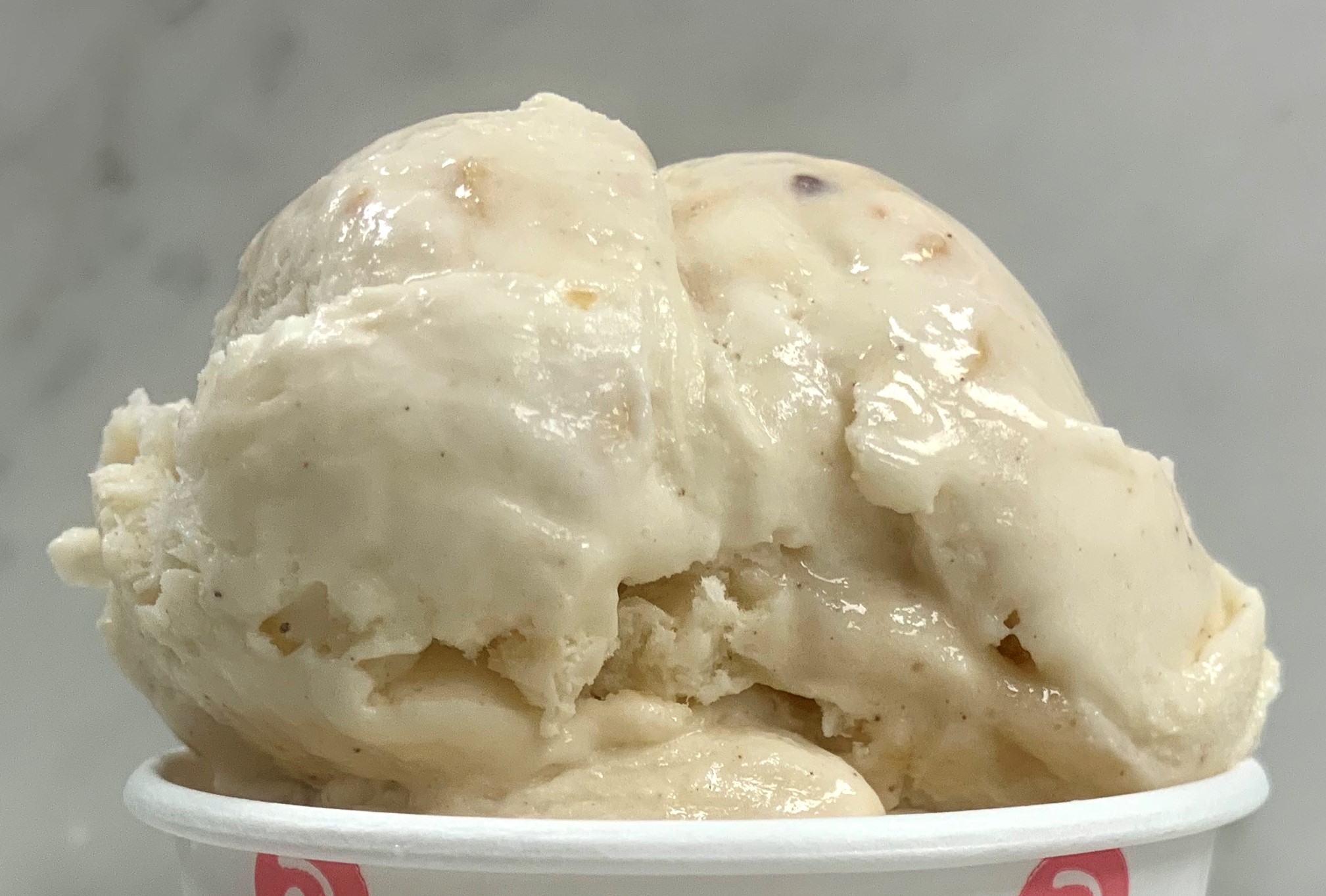 Order Brown Butter Peanut Brittle Ice Cream food online from The Comfy Cow store, Louisville on bringmethat.com