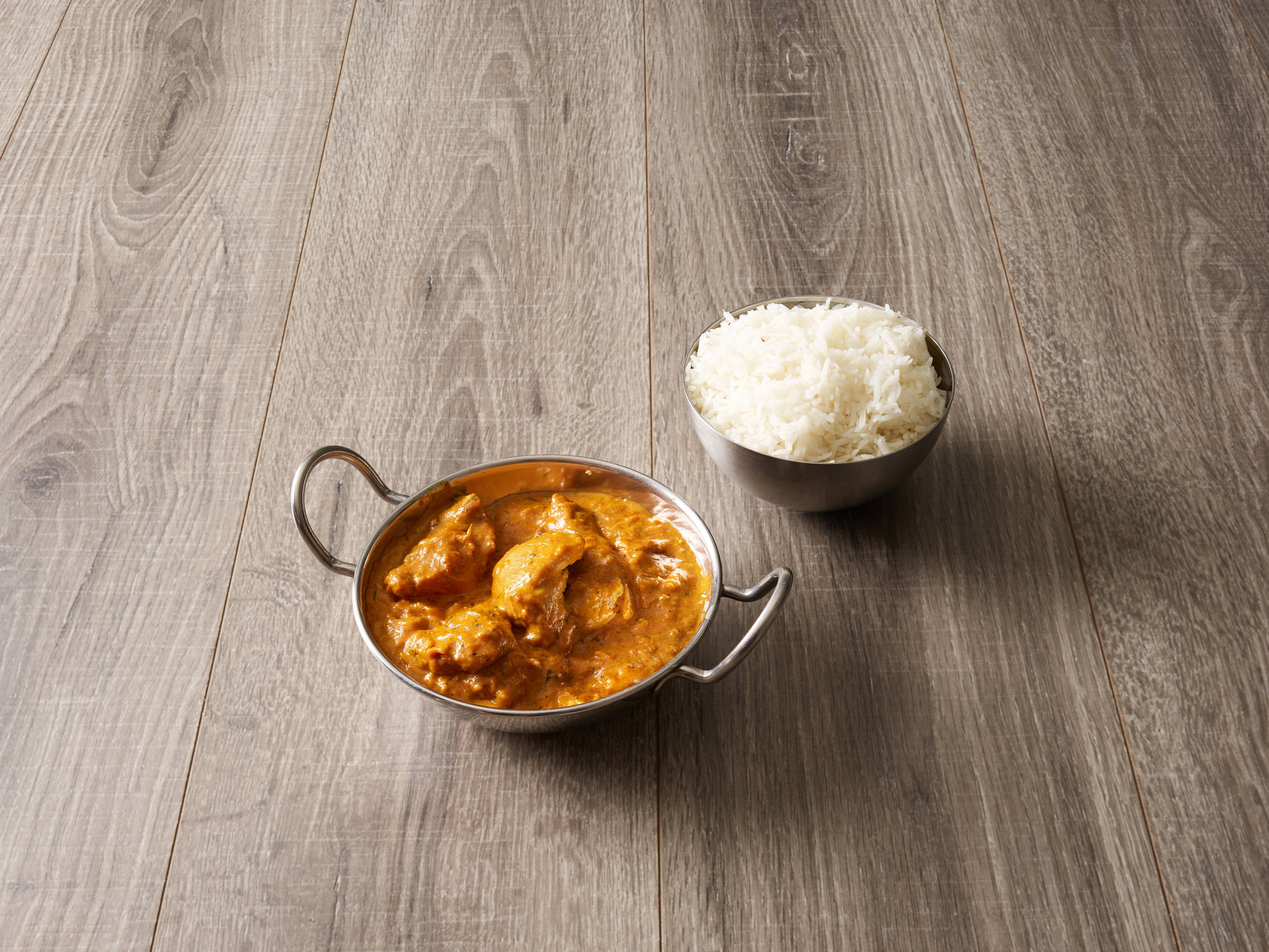 Order Chicken Korma food online from India Express store, Denver on bringmethat.com