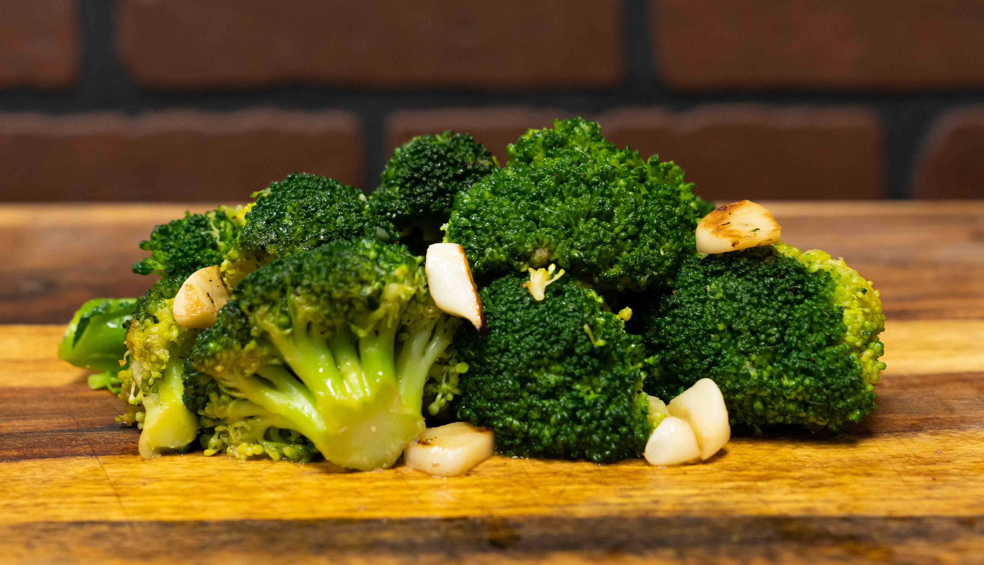 Order Broccoli in Garlic and Oil food online from Big Belly Que store, Smithtown on bringmethat.com