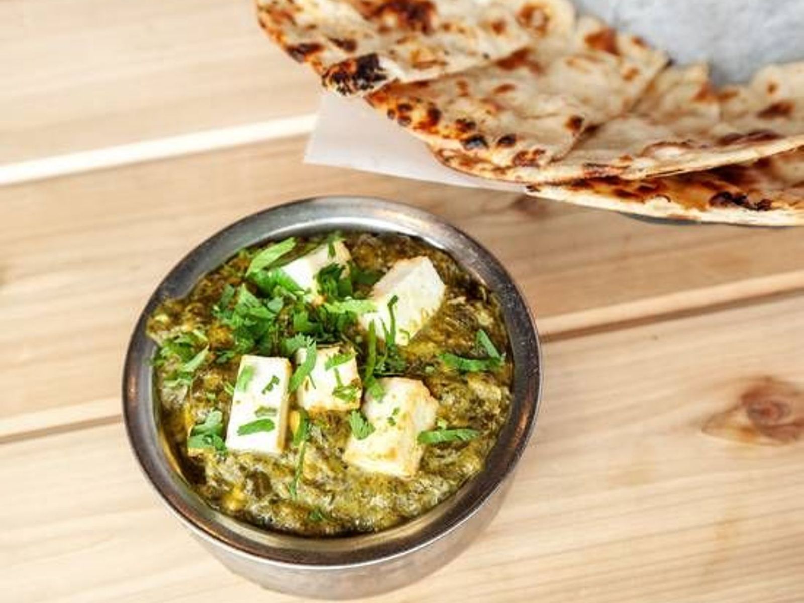 Order Saag Paneer (Vegetarian) food online from Chutneys Indian Cuisine store, Vancouver on bringmethat.com