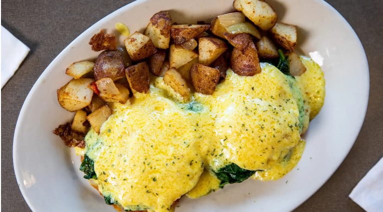 Order Eggs Benedict food online from The Common Neighborhood Eatery store, Foxborough on bringmethat.com