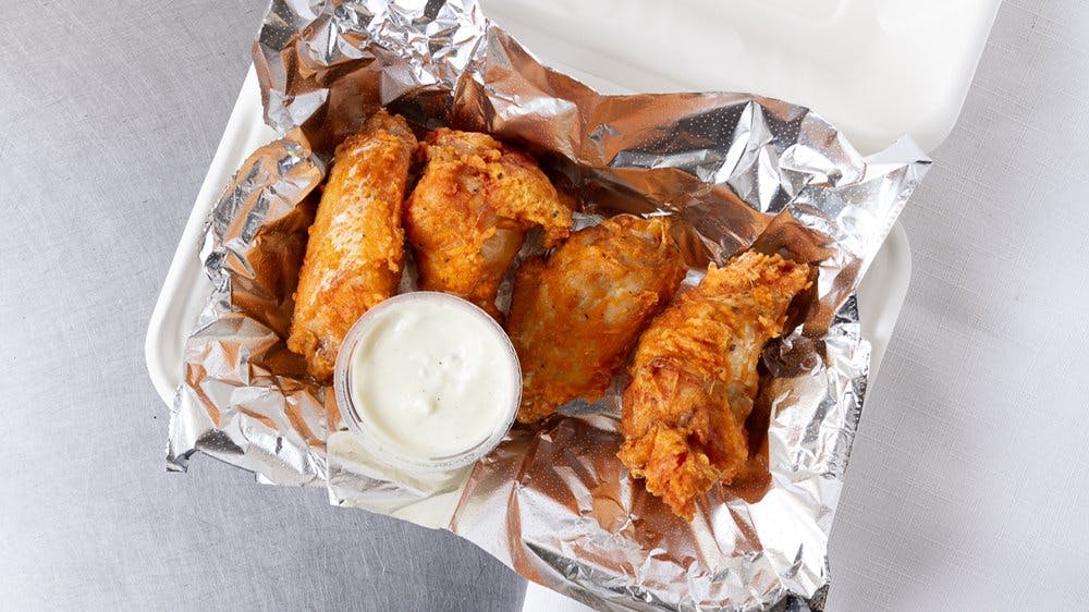 Order Oven Baked Buffalo Wings - 6 Pieces food online from Pizza Boli store, Brooklyn Park on bringmethat.com