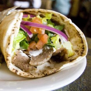 Order Gyro Pita Sandwich food online from The Roasting Oven store, Fort Mill on bringmethat.com