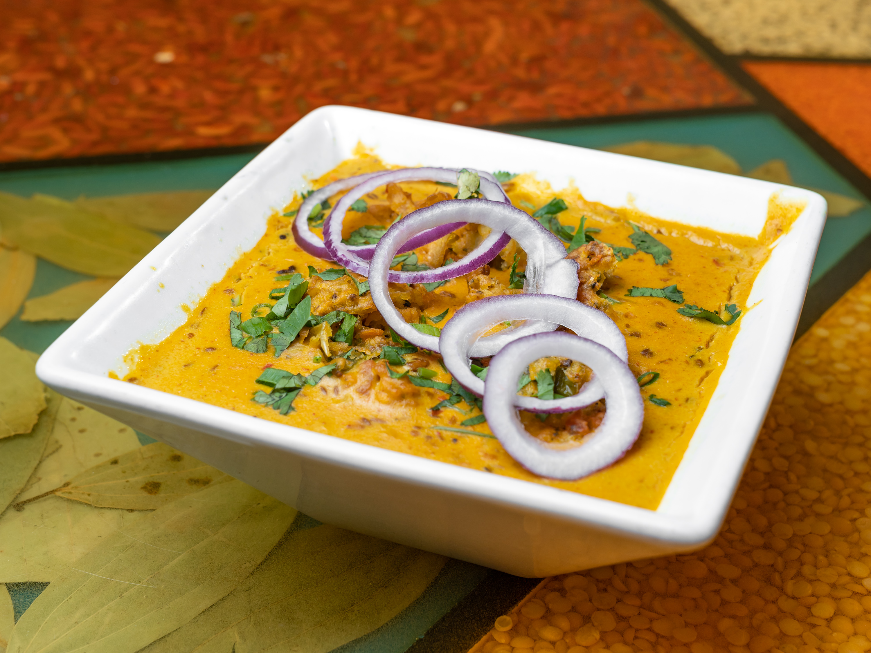 Order Punjabi Kadhi Pakora food online from Singhs Cafe store, Wellesley Hills on bringmethat.com