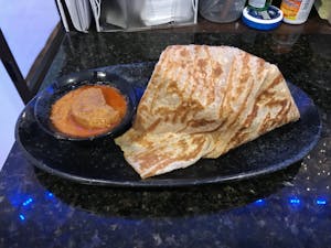 Order A 1. Roti Canai food online from House Malaysian store, Cliffside on bringmethat.com
