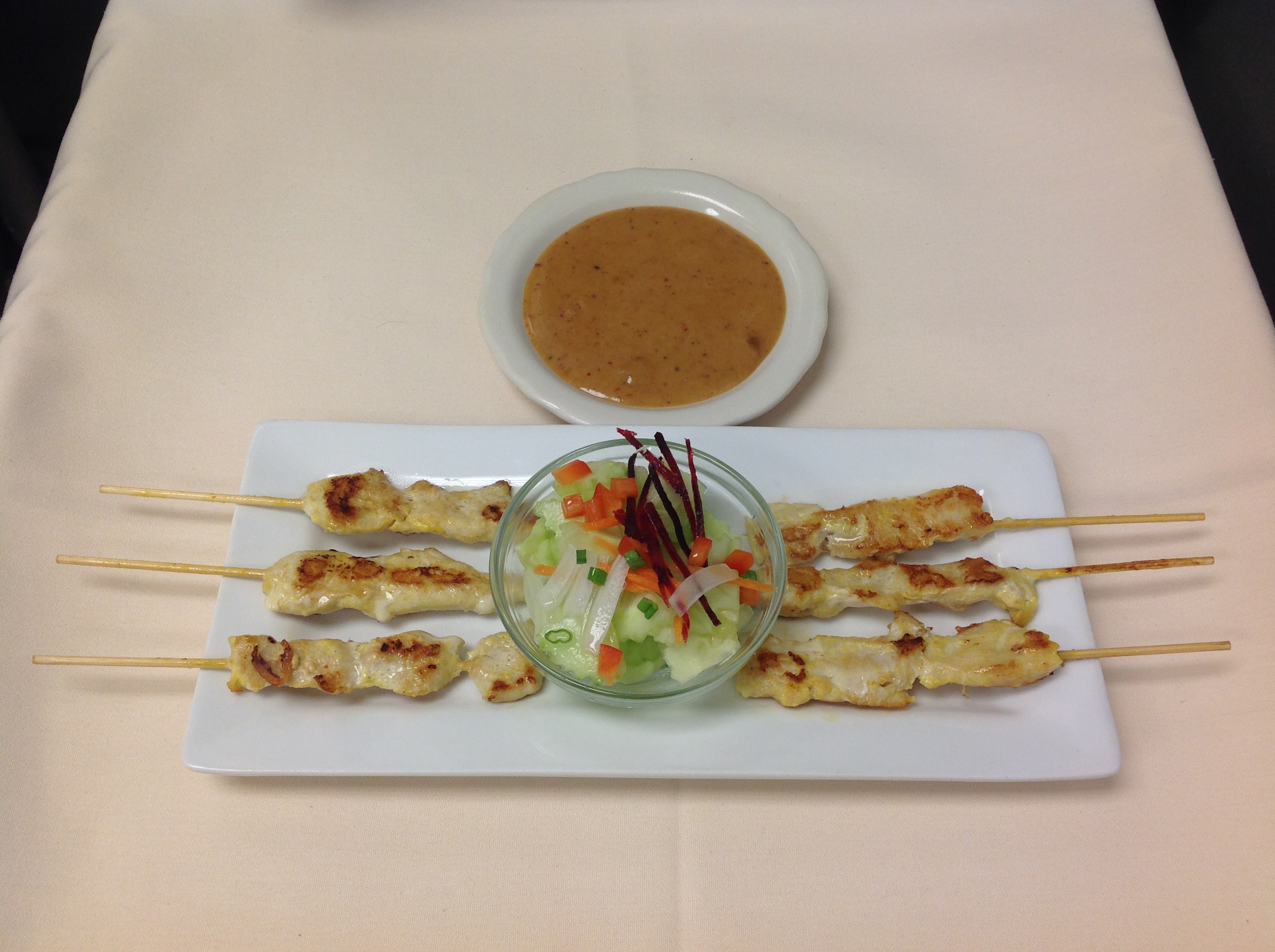 Order 3. Satay Chicken food online from Nine Thai Cuisine store, Chicago on bringmethat.com