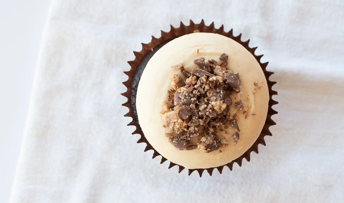 Order Peanut Butter Cupcake food online from Smallcakes - Bryant store, Bryant on bringmethat.com